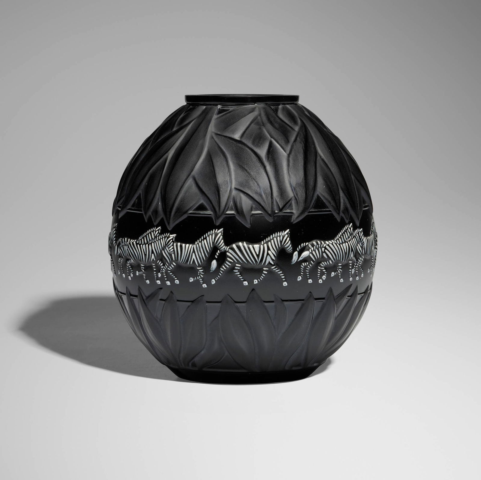 Marie-Claude Lalique, Tanzania zebra vase (black): Marie-Claude Lalique Tanzania zebra vase (black) Lalique France, 1991 molded and enameled black glass 8.25 h x 7.75 dia in (21 x 20 cm) Etched manufacturer's mark and number to underside 'Lalique