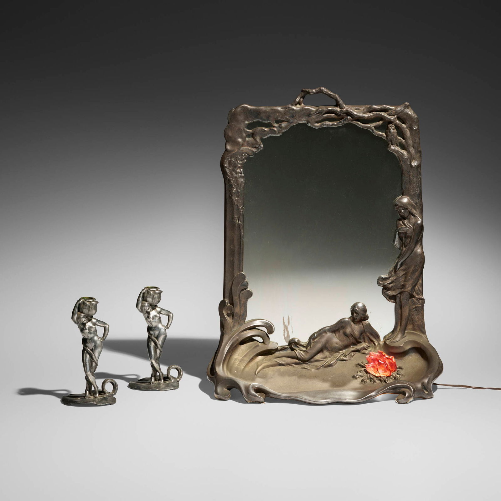 Charles Theodore Perron, Illuminated figural mirror and candlesticks, pair: Charles Theodore Perron Illuminated figural mirror and candlesticks, pair France, c. 1900 patinated metal, silvered bronze, mirrored glass, glass mirror: 23.5 h x 19.5 w x 10.5 d in (60 x 50 x 27