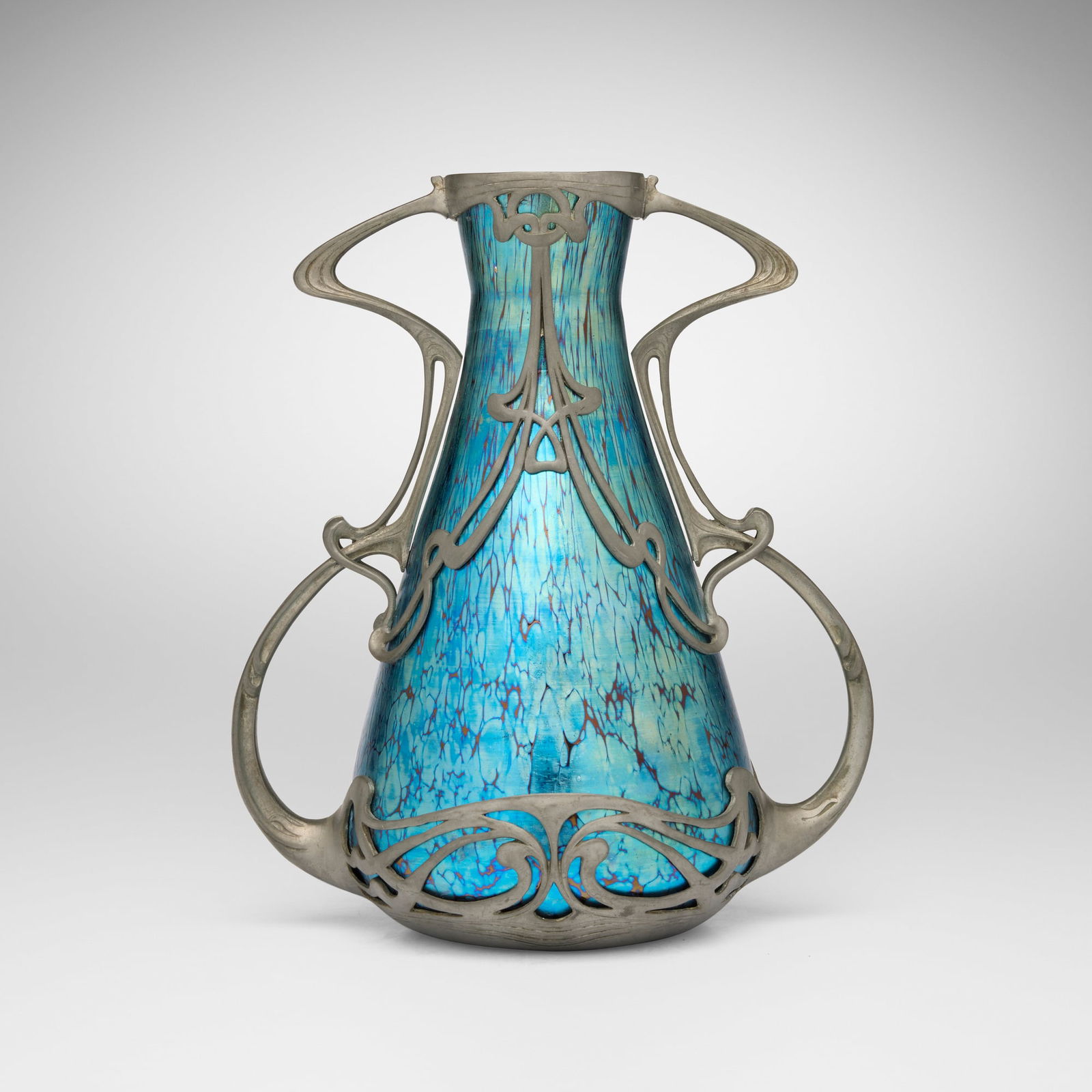 Loetz, Papillon vase with Art Nouveau mount: Loetz Papillon vase with Art Nouveau mount Austria, c. 1898 hand-blown glass, pewter 10.125 h x 8.5 w x 5.5 d in (26 x 22 x 14 cm) Provenance: Plantation Galleries, Davison, MI | Acquired from the