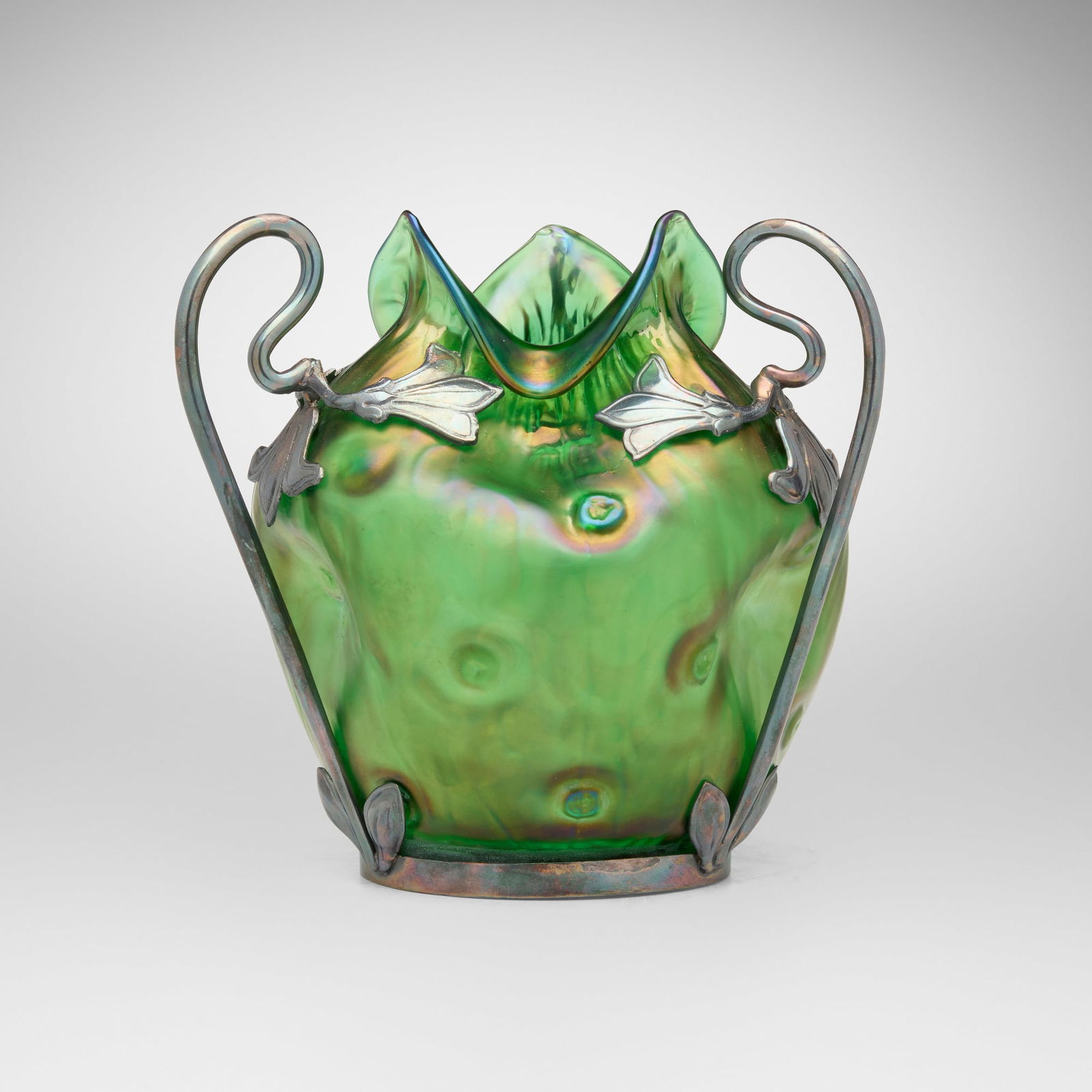 Loetz, Rusticana vase with Art Nouveau mount: Loetz Rusticana vase with Art Nouveau mount Austria, c. 1899 hand-blown glass, pewter 7 h x 7 dia in (18 x 18 cm) Impressed to underside of metal overlay '1850'. Provenance: Plantation Galleries,