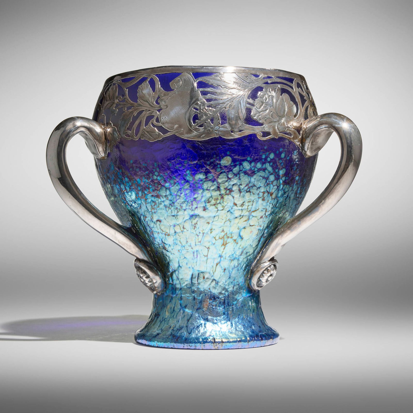 Loetz, Phanomen loving cup with silver overlay (Gre 377): Loetz Phanomen loving cup with silver overlay (Gre 377) Austria, c. 1900 hand-blown glass, silver 10.25 h x 10.75 dia in (26 x 27 cm) Etched manufacturer's mark and number to underside '346/727