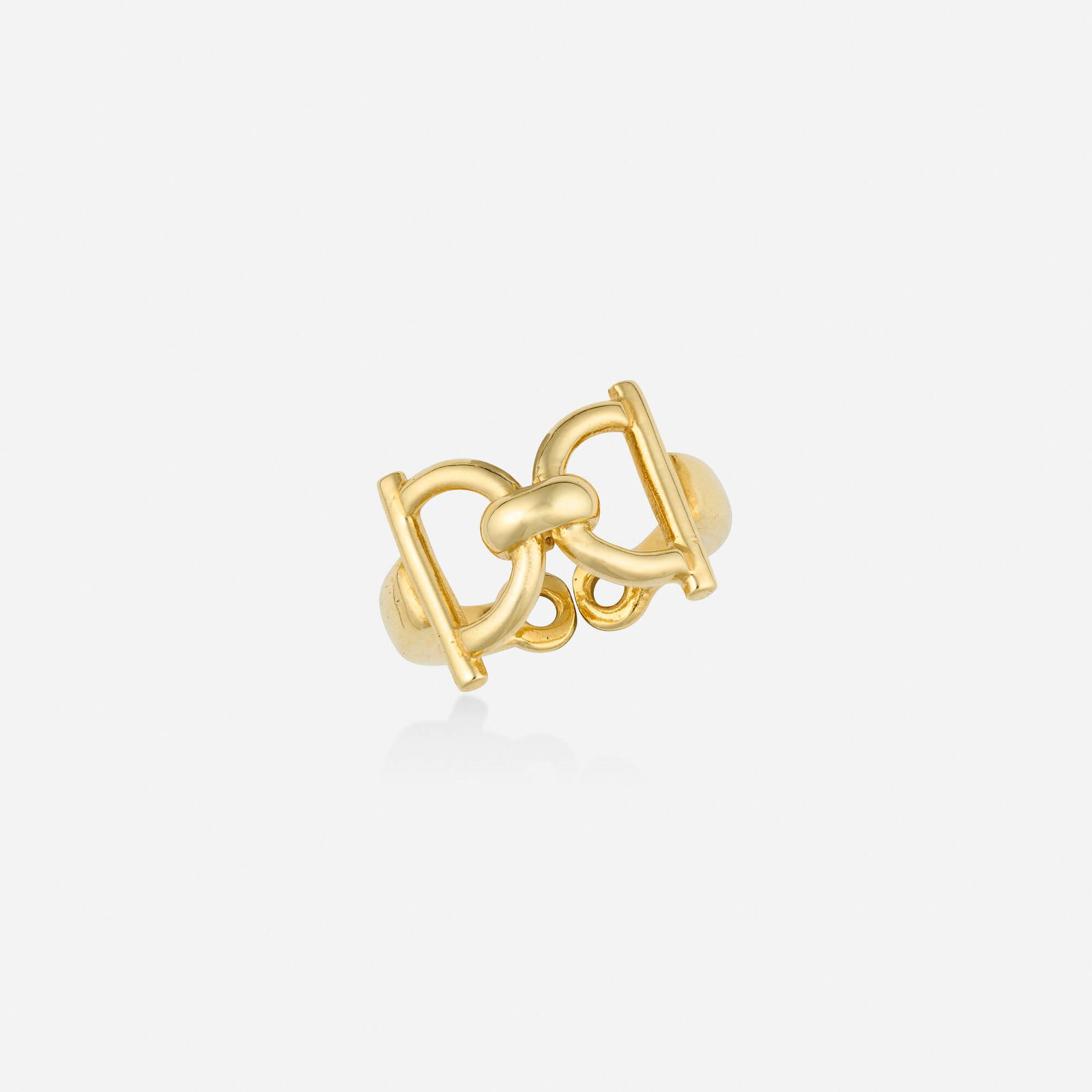 Gucci, Gold ring: Gucci Gold ring Designed as a curved horse bit 18k yellow gold Signed Gucci Ring size 5; Gross weight 4.7 dwts This work will ship from Lambertville, New Jersey.