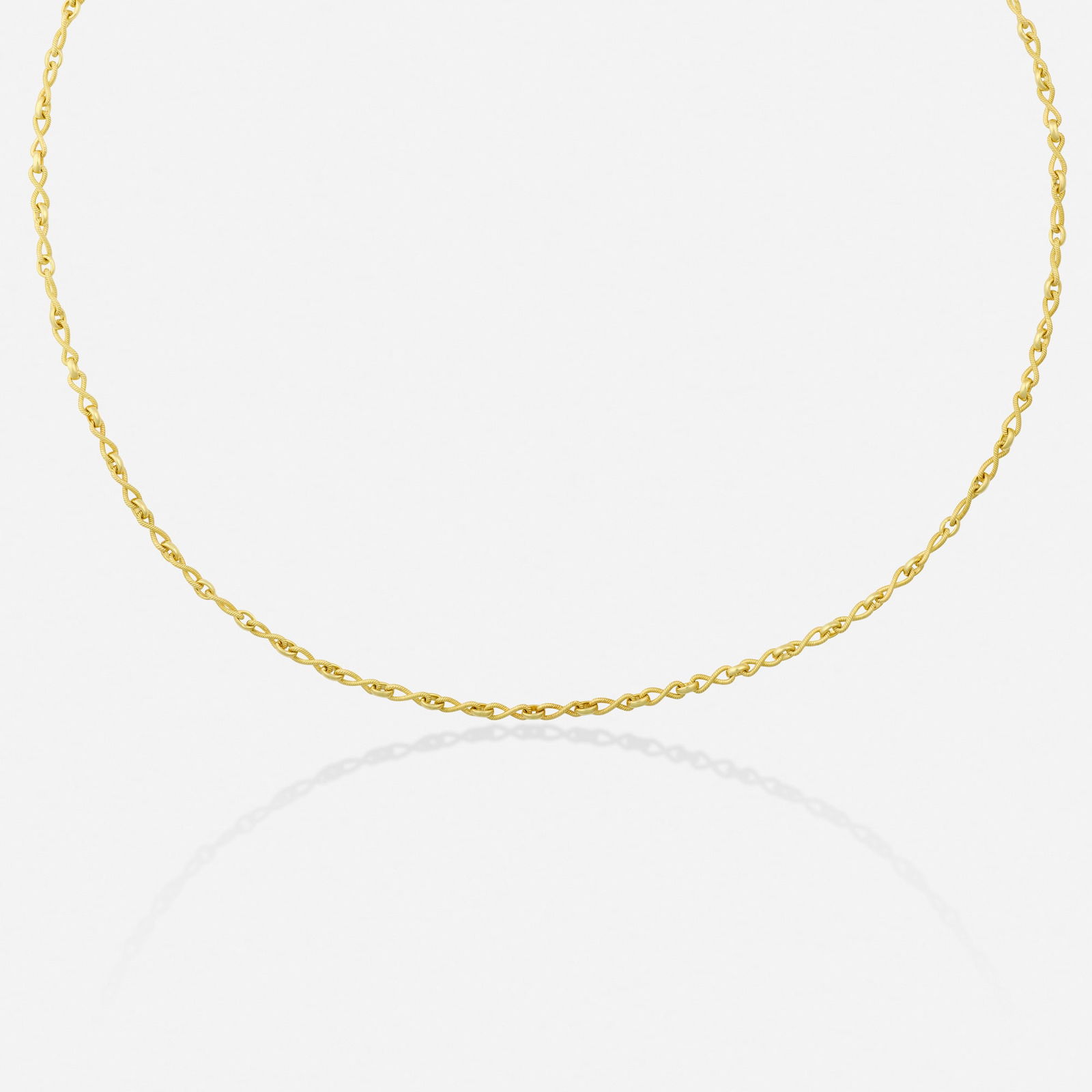 Italian, Gold necklace: Italian Gold necklace Of polished and roped links 18k yellow gold 18 in; Gross weight 6.9 dwts This work will ship from Lambertville, New Jersey.