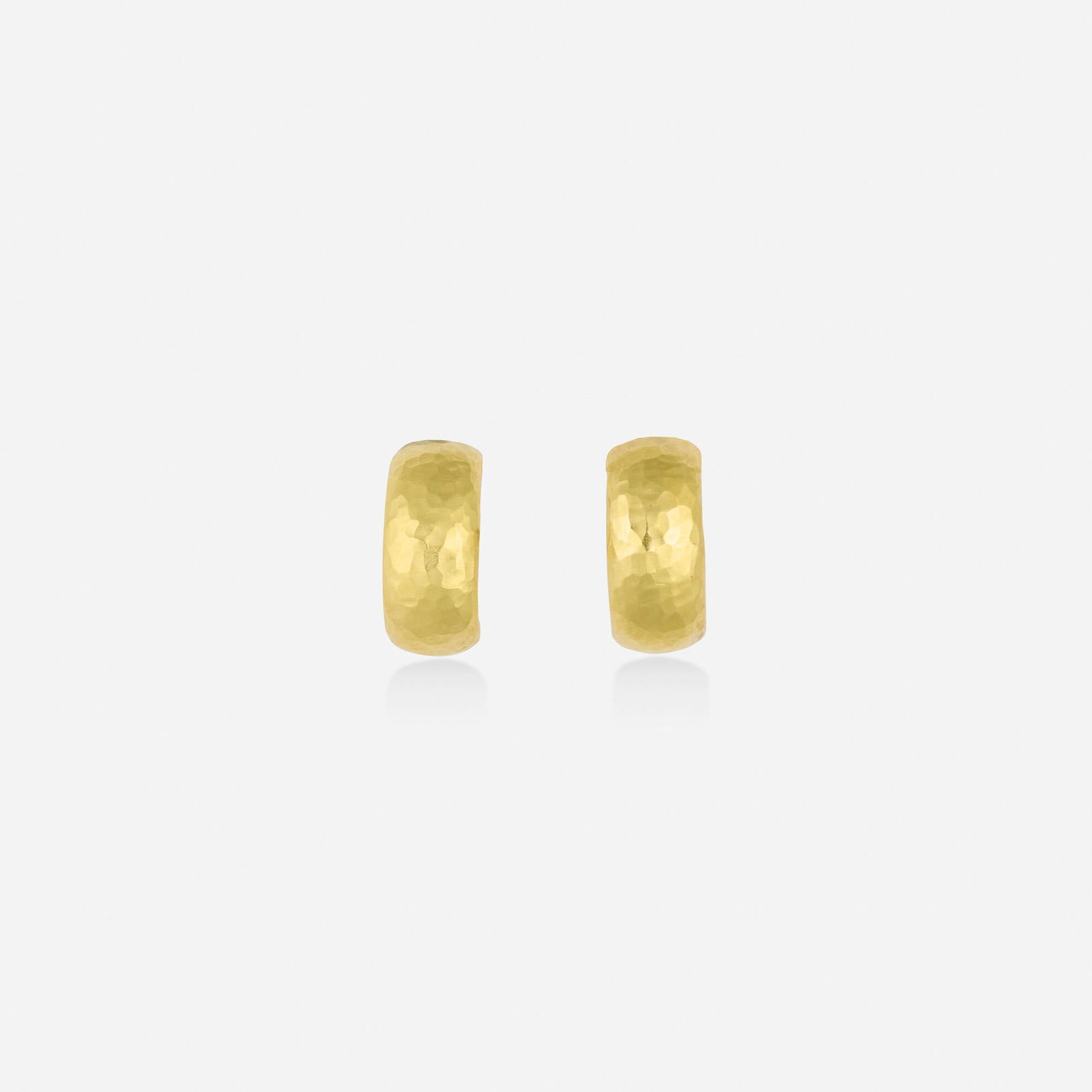 Paloma Picasso for Tiffany & Co., Gold earrings: Paloma Picasso for Tiffany & Co. Gold earrings Each of hammered gold; 1989 18k yellow gold Signed Paloma Picasso Tiffany & Co. 0.75 x 0.25 in; Gross weight 6.9 dwts This work will ship from