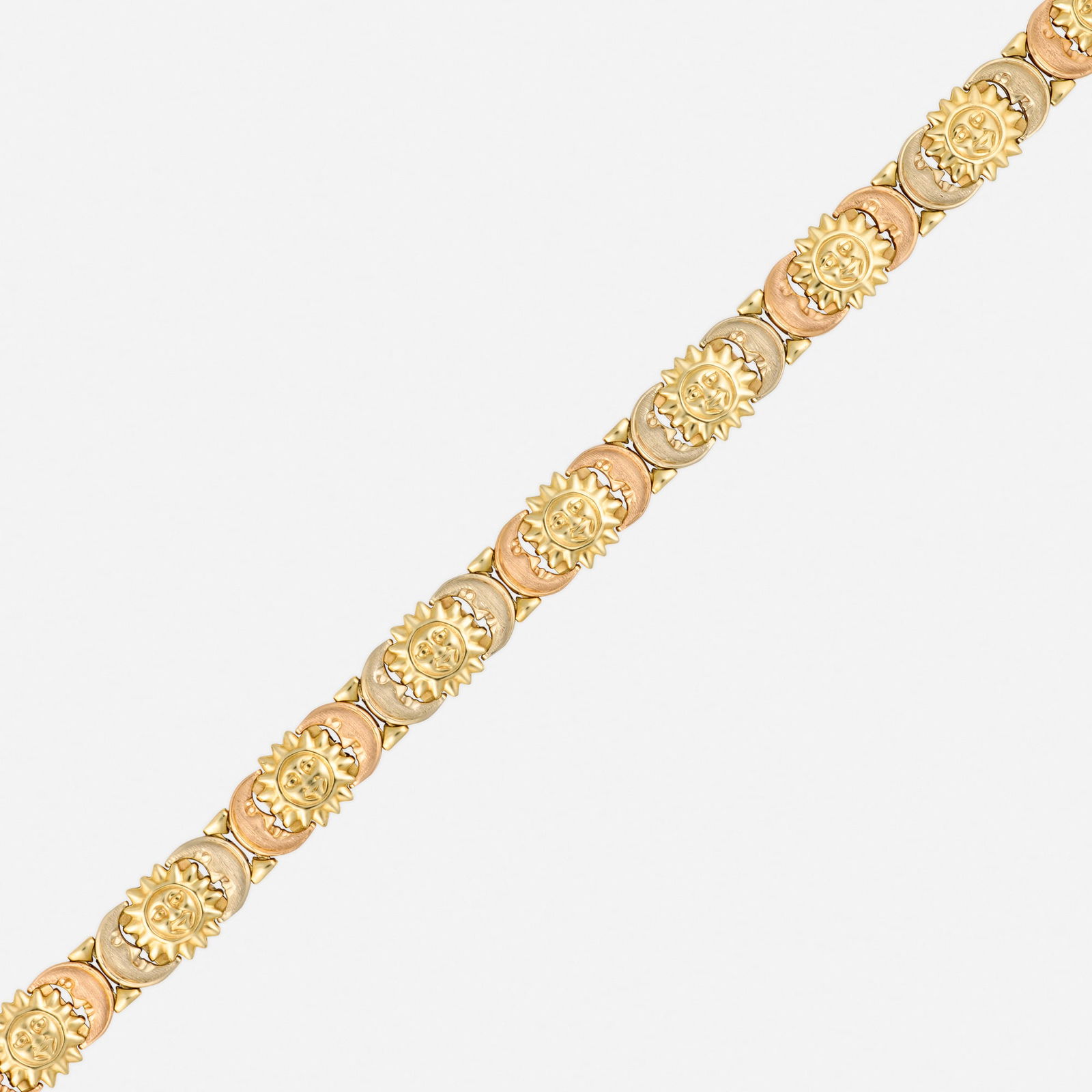 Italian, Tricolor gold bracelet: Italian Tricolor gold bracelet Designed with alternating sun and crescent moon motifs 14k yellow, white, and pink gold 7.375 x 0.375 in; Gross weight 11.2 dwts This work will ship from