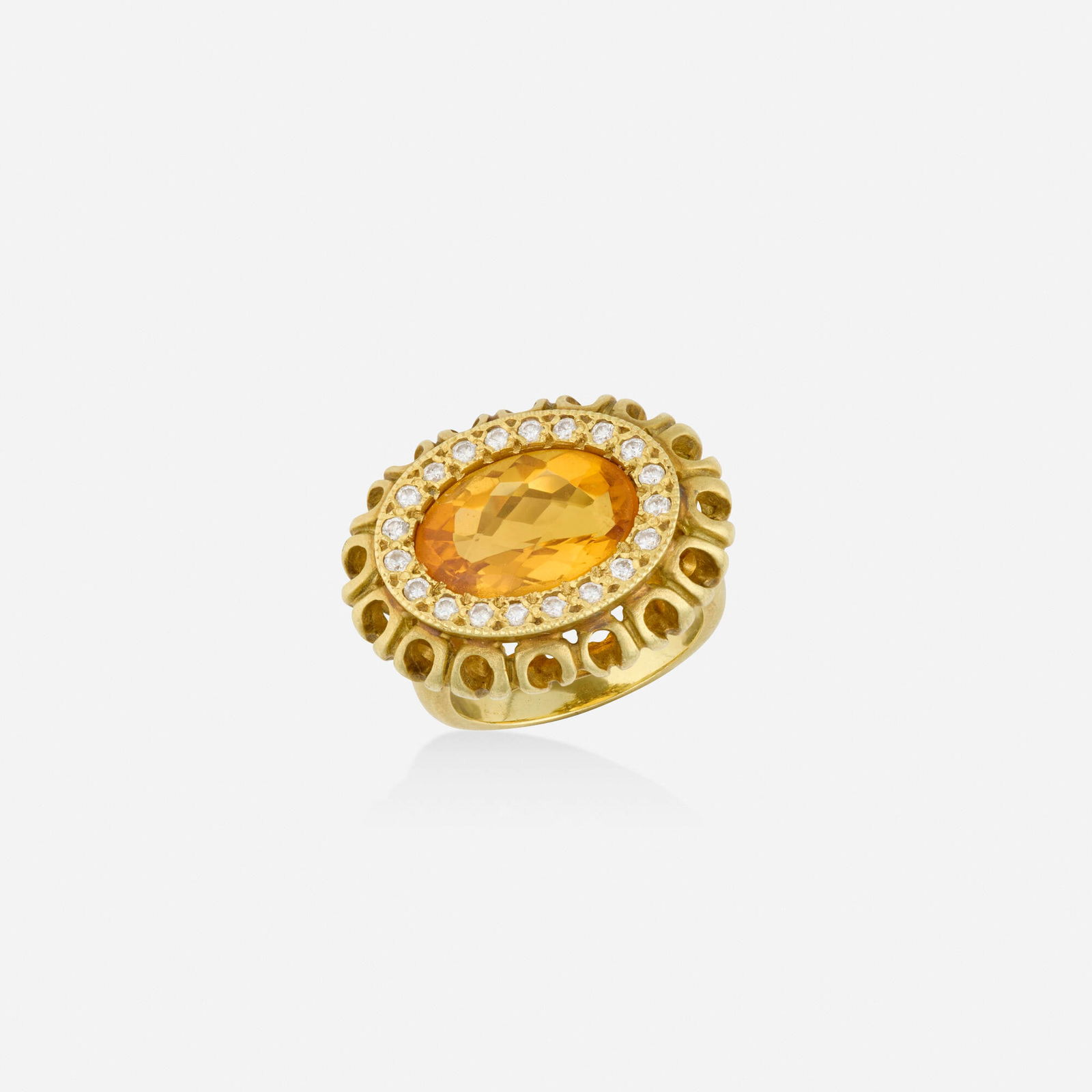 J.J. Marco, Citrine, diamond, and gold ring: J.J. Marco Citrine, diamond, and gold ring Set with an oval-cut citrine, framed by round brilliant-cut diamonds 18k yellow gold Signed J.J. Marco Ring size 6.50; Gross weight 9.3 dwts This work