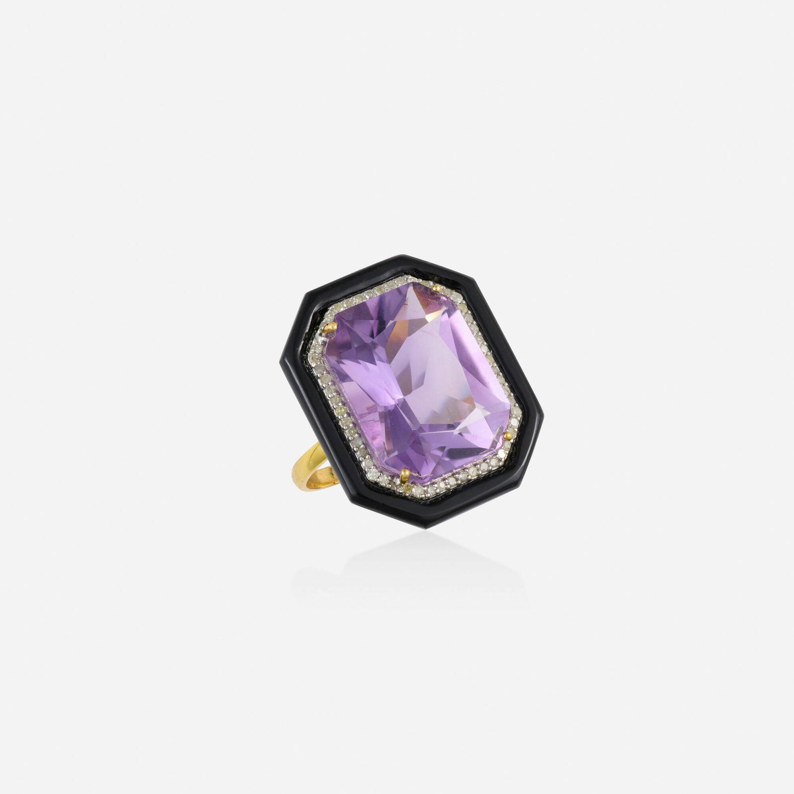 Amethyst, black onyx, and diamond ring: Amethyst, black onyx, and diamond ring Set with an octagonal-cut amethyst, framed by single-cut diamonds and polished black onyx Silver and yellow gold Ring size 7.25; Gross weight 5.7 dwts This