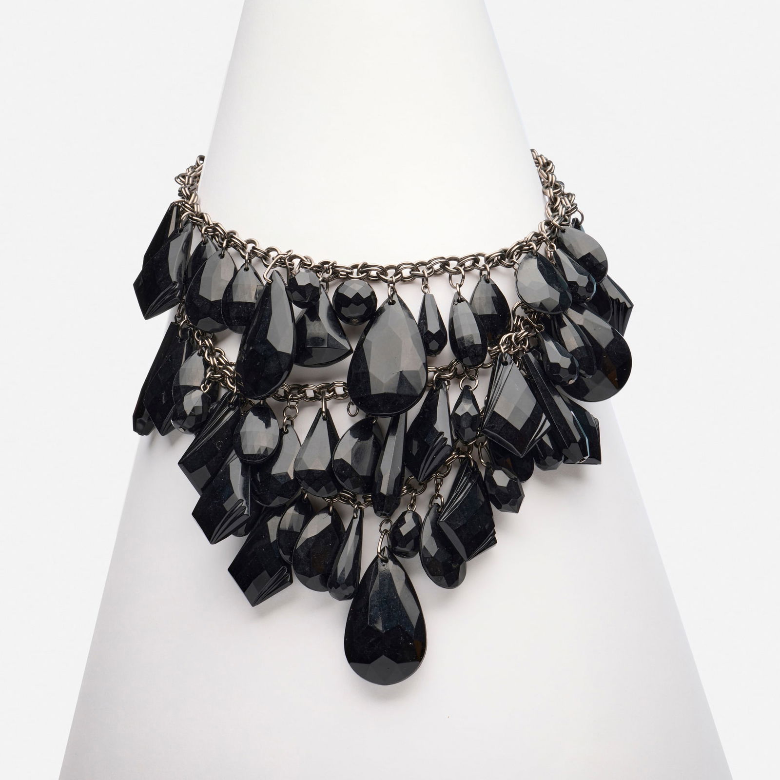 Lee Angel, Costume necklace: Lee Angel Costume necklace Designed with three strands of faceted black beads Base metal Signed Lee Angel 17 in; Gross weight 146.6 dwts Provenance: Private Collection of Mari Shaw This work