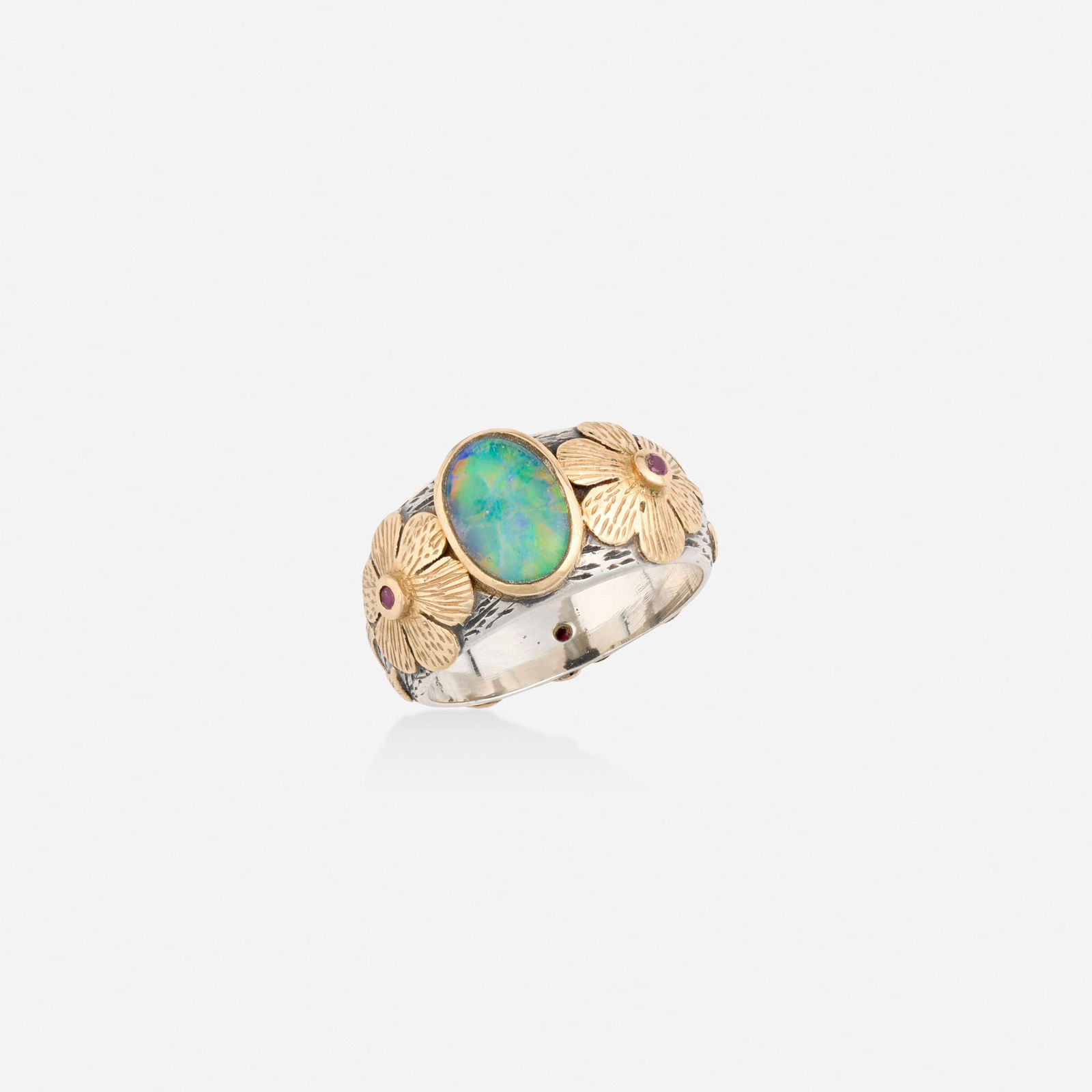 Inaya, Multi-gem, gold, and silver ring: Inaya Multi-gem, gold, and silver ring Of floral design, set with a cabochon opal and circular-cut rubies 18k yellow gold and sterling silver Signed InnaSense Ring size 5.75; Gross weight 4.6 dwts 