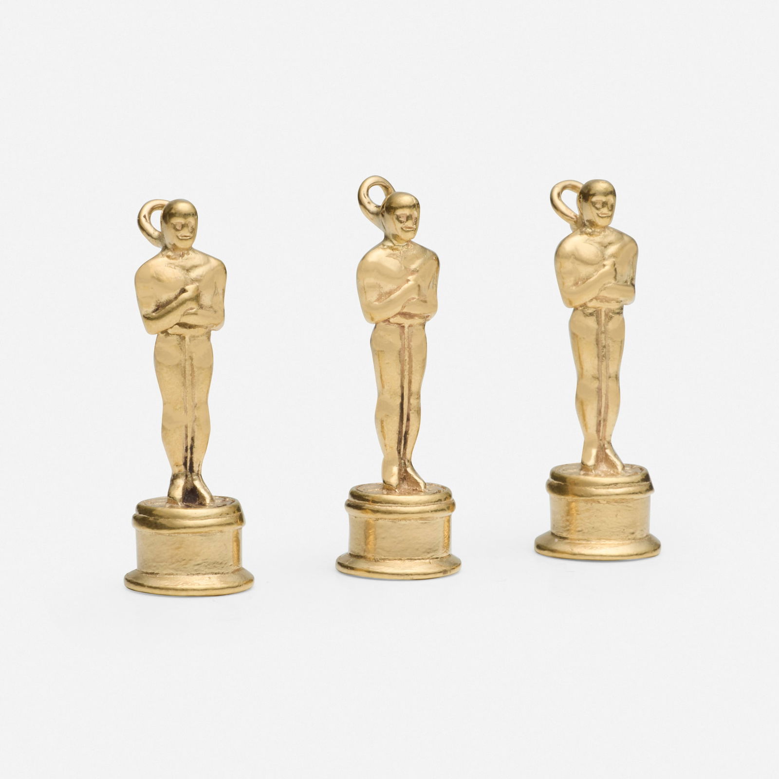 Three gold charms: Three gold charms Robert Lee Surtees A.S.C. (August 9, 1906 - January 5, 1985), was a Hollywood cinematographer. His career included working on some of the most well know movies in motion picture