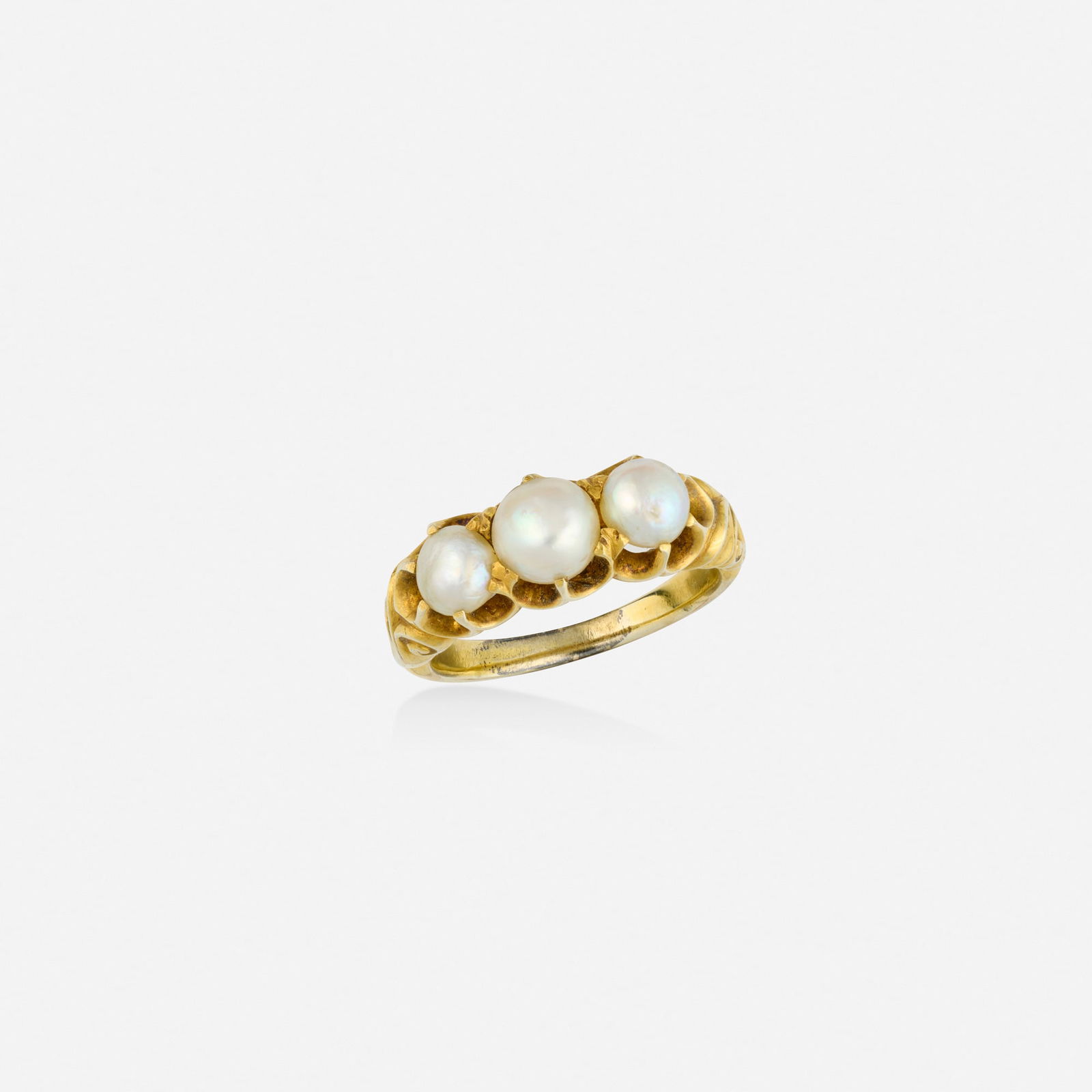 Cultured pearl and gold ring: Cultured pearl and gold ring Set with three cultured pearls Yellow gold Ring size 6.50; Gross weight 3.6 dwts This work will ship from Lambertville, New Jersey.