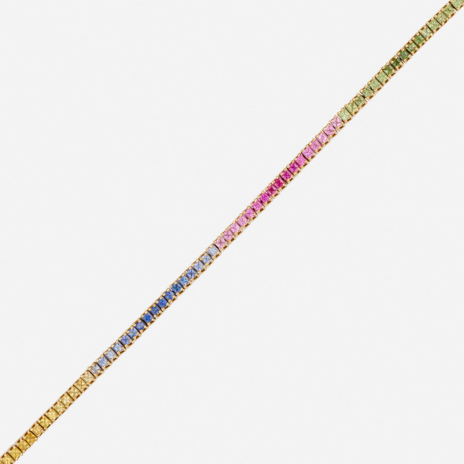 Multi-gem and gold bracelet: Multi-gem and gold bracelet Set with square-cut fancy-color sapphires 14k yellow gold Approx. 7.50 x 0.125 in; Gross weight 9.2 dwts This work will ship from Lambertville, New Jersey.