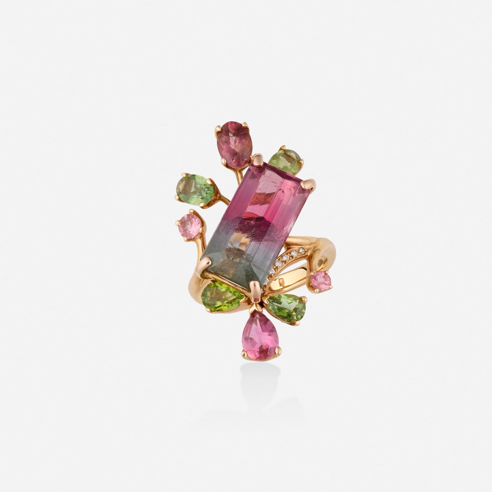 Tourmaline, diamond, and pink gold ring: Tourmaline, diamond, and pink gold ring Set with an emerald-cut watermelon tourmaline, pear, oval, and circular-cut pink and green tourmalines, and round brilliant-cut diamonds 14k pink gold Ring size