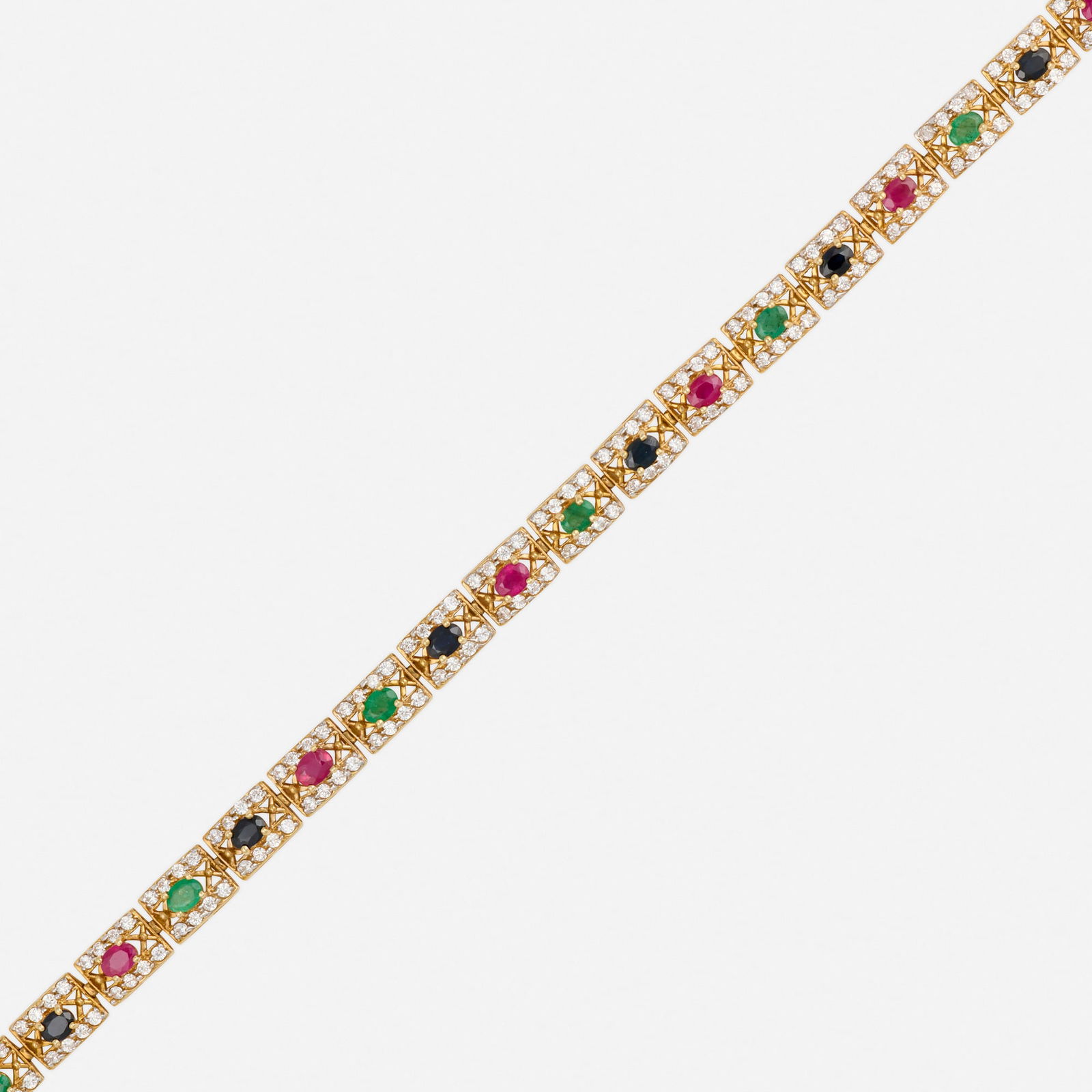 Multi-gem, diamond, and gold bracelet: Multi-gem, diamond, and gold bracelet Set with oval-cut rubies, sapphires, and emeralds bordered by round brilliant-cut diamonds 14k yellow gold 7 x 0.25 in; Gross weight 7.1 dwts This work will
