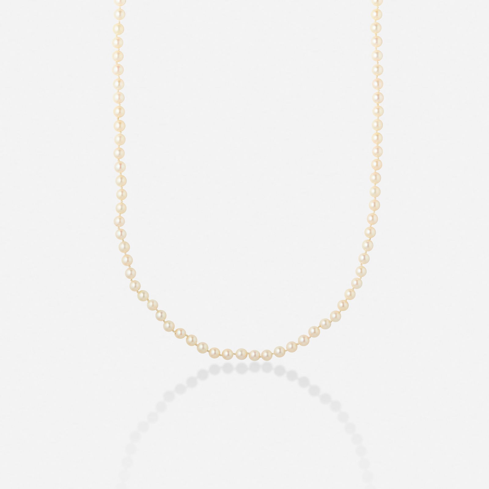 Cultured pearl and gold necklace: Cultured pearl and gold necklace Strung with 112 cultured pearls measuring approx. 7.00 mm, joined by a blister pearl clasp 14k yellow gold 40.50 in; Gross weight 43.5 dwts This work will ship