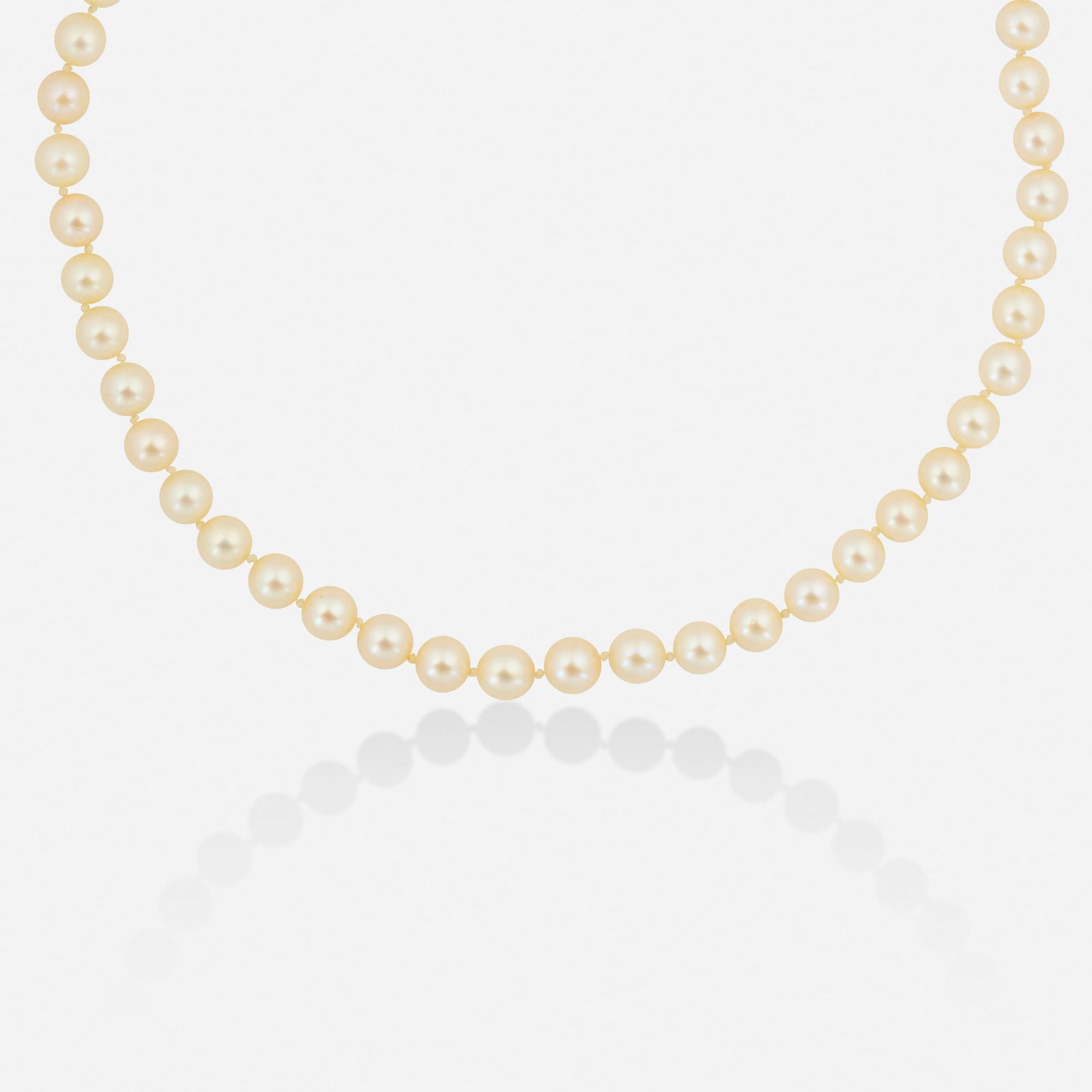 Cultured pearl, diamond, and white gold necklace: Cultured pearl, diamond, and white gold necklace Strung with 49 cultured pearls measuring approx. 6.80-7.40 mm, the clasp set with single-cut diamonds and cultured pearls 14k white gold 17 in; Gross