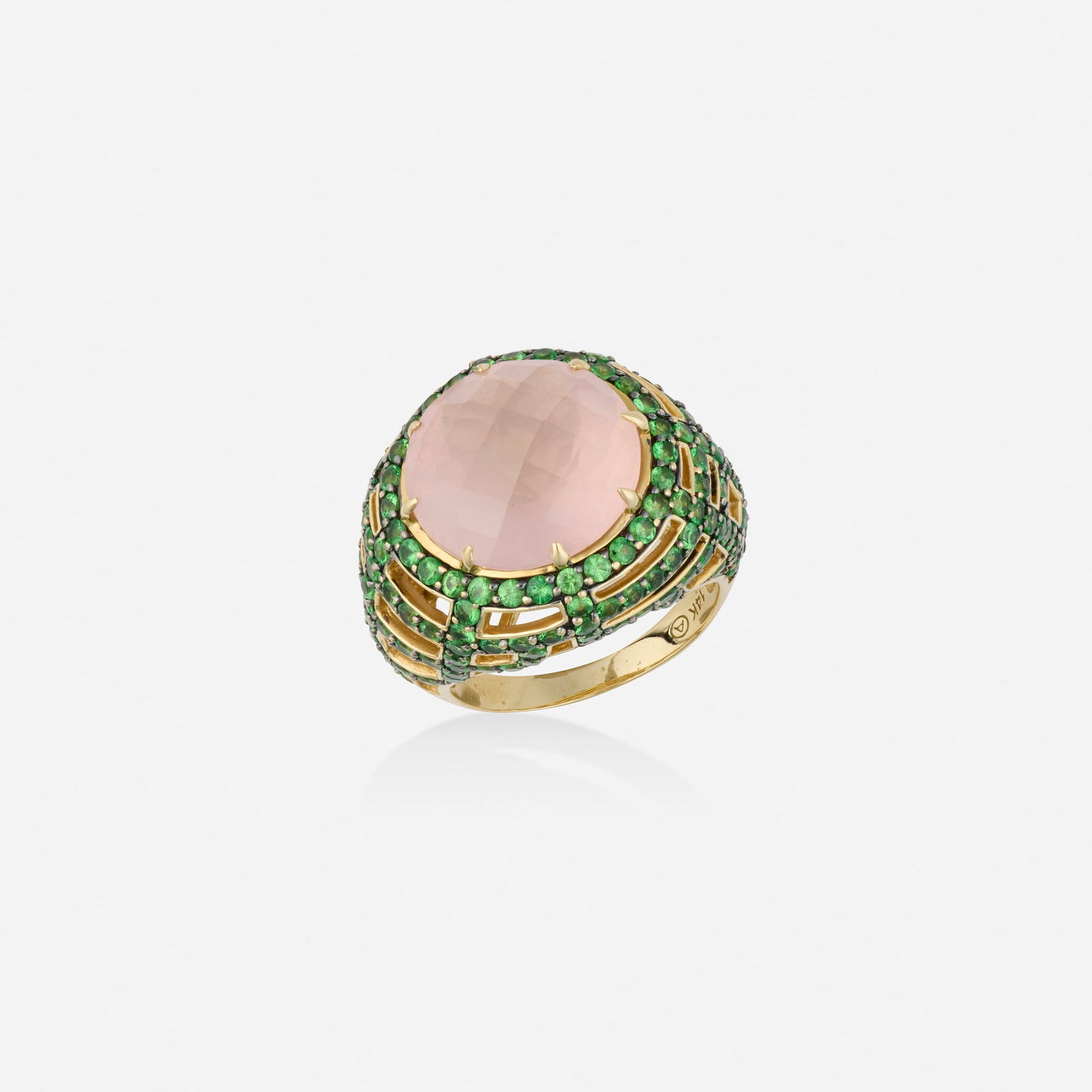 Multi-gem and gold ring: Multi-gem and gold ring Centered on a checkerboard-cut pink quartz, the woven basket set with circular-cut tsavorite garnet 14k yellow gold Ring size 7; Gross weight 6.1 dwts This work will ship from
