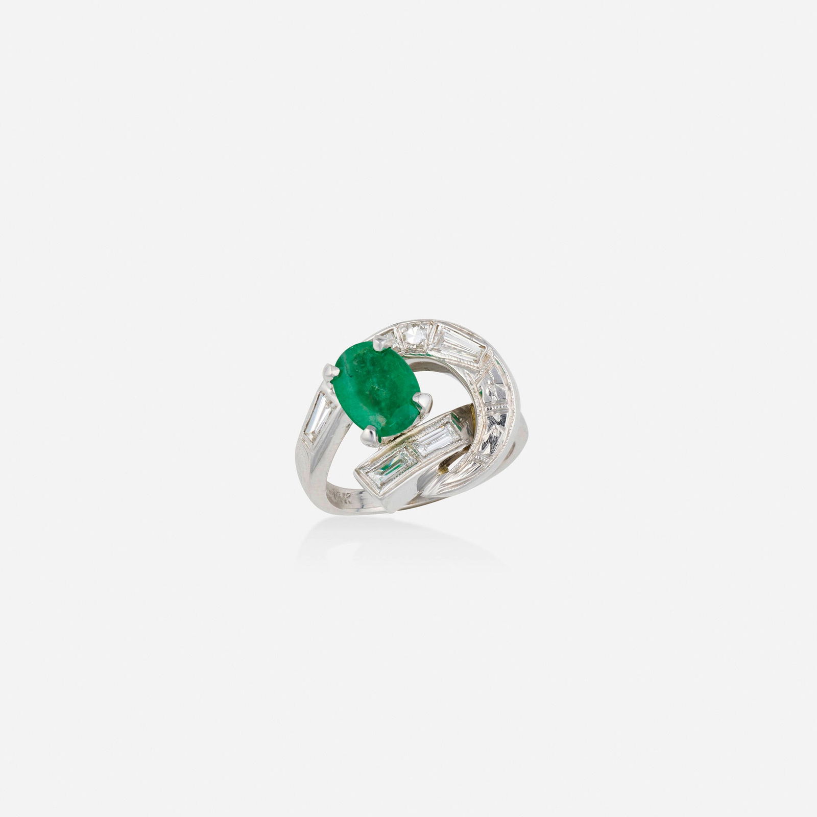 Emerald, diamond, and white gold ring: Emerald, diamond, and white gold ring Set with an oval-cut emerald, baguette and single-cut diamonds 14k white gold Ring size 4; Gross weight 3.2 dwts This work will ship from Lambertville, New