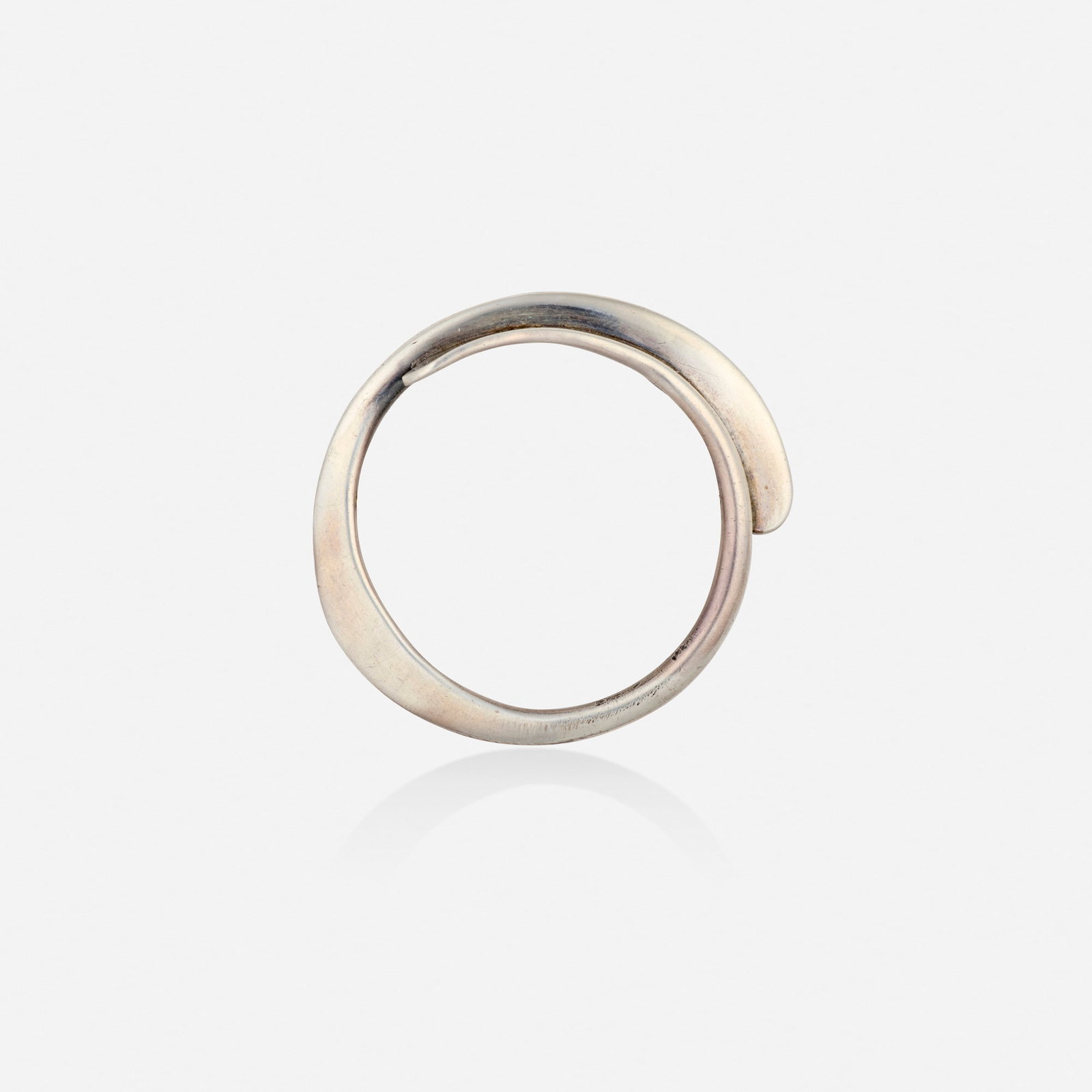 Art Smith, Sterling silver brooch: Art Smith Sterling silver brooch Of circular design Sterling silver Signed Art Smith 1.875 x 1.75 in; Gross weight 9.6 dwts This work will ship from Lambertville, New Jersey.