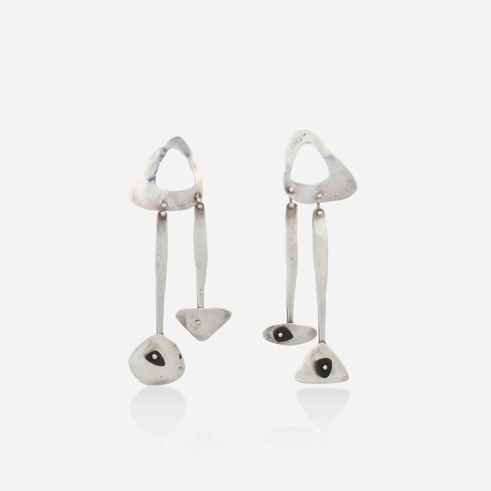 Ed Wiener, Sterling silver and wood earrings: Ed Wiener Sterling silver and wood earrings Of modernist design, set with wooden beads Sterling silver Signed Ed Wiener 3.50 x 1 in; Gross weight 11.2 dwts Provenance: Co