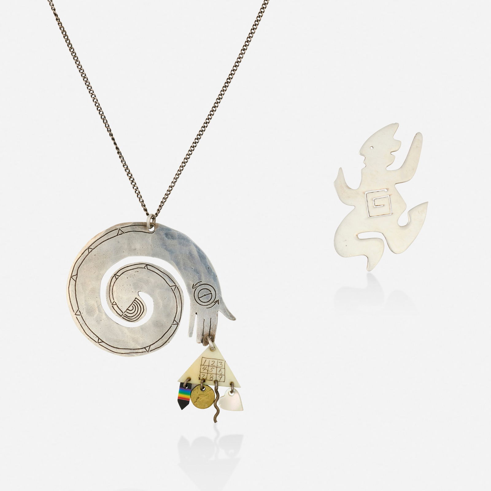 Silver necklace with brooch: Silver necklace with brooch Please note this work contains materials that may be either protected or regulated and will require authorization from the U.S. Fish and Wildlife Service (FWS) prior to exp