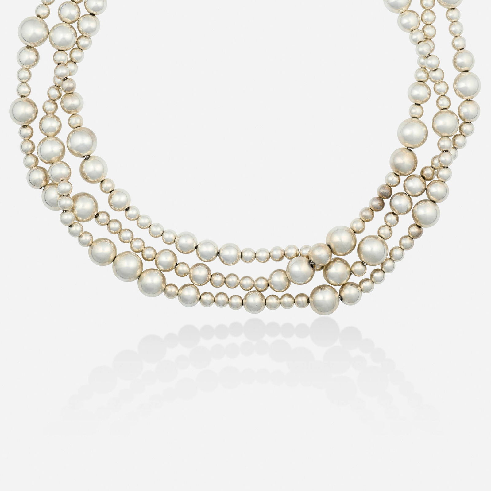 Tiffany & Co., Sterling silver necklace: Tiffany & Co. Sterling silver necklace Designed with three rows of sterling silver beads Sterling silver Signed T&Co. 19 in; Gross weight 70.9 dwts Sold with signed box and pouch This work will