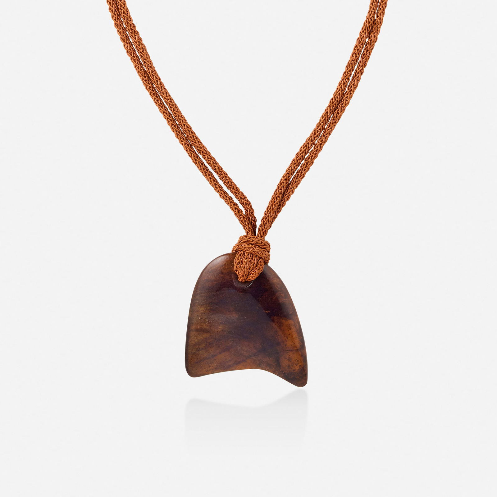 Cara Croninger, Necklace: Cara Croninger Necklace Designed with large pieces of polished and carved resin, joined by a woven cord; 1977 Signed Croninger Necklace 55 in, pendant 4 x 3.75 in; Gross weight 115.9 dwts This