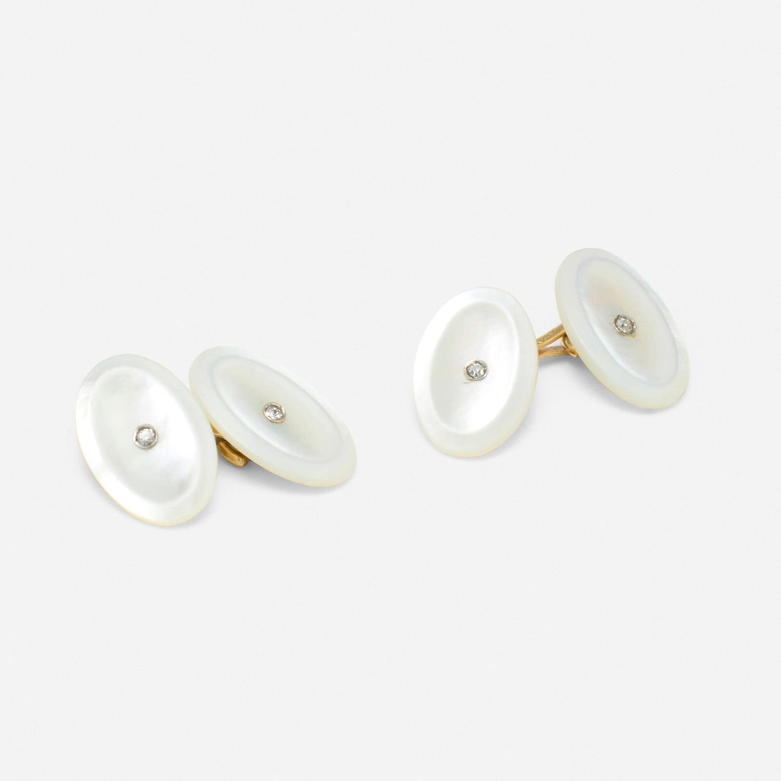 Mother-of-pearl, diamond, and gold cufflinks: Mother-of-pearl, diamond, and gold cufflinks Please note this work contains materials that may be either protected or regulated and will require authorization from the U.S. Fish and Wildlife Service