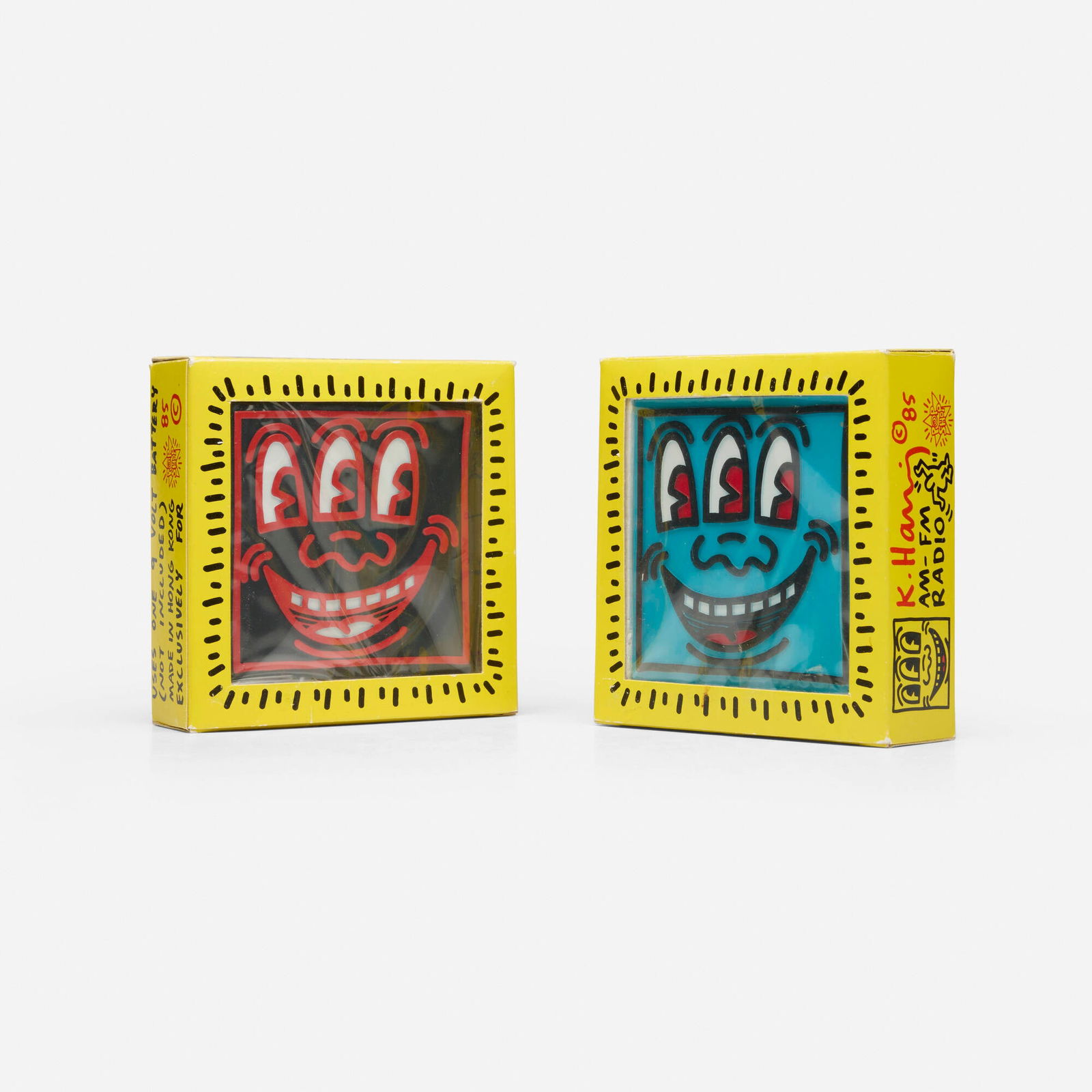 Keith Haring, Pop Shop AM/FM radios (two works): Keith Haring Pop Shop AM/FM radios (two works) 1985 molded plastic radio (each): 4.5 h x 4.25 w x 1.375 d in (11 x 11 x 3 cm) packaging (each): 5.25 h x 5.25 w x 1.5 d in (13 x 13 x 4 cm) Molded