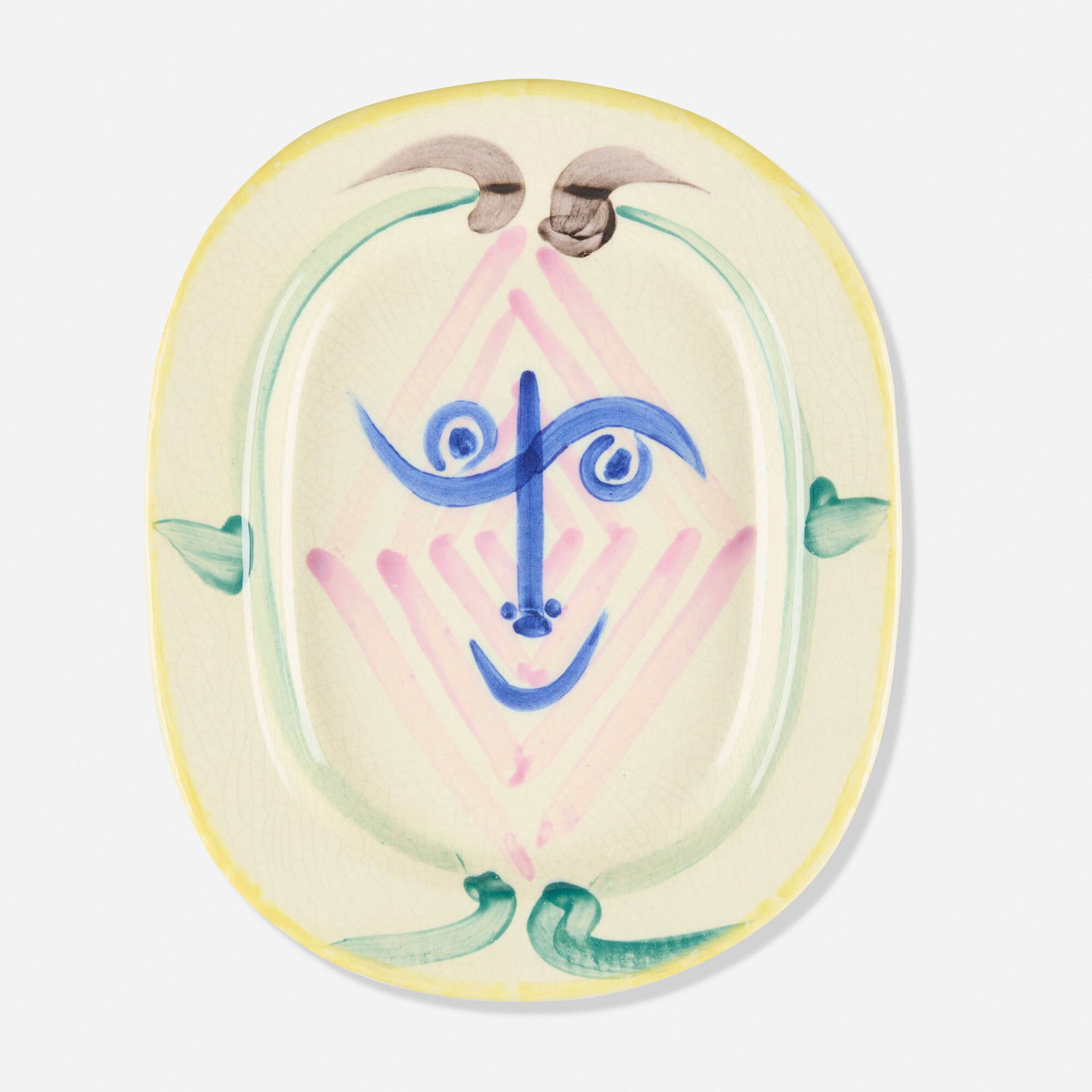 Pablo Picasso, Le tete de faun: Pablo Picasso Le tete de faun 1948white earthenware clay, decoration in engobes and oxides under glaze 1.75 h x 12.5 w x 15.25 d in (4 x 32 x 39 cm) Incised number to underside 'I-122 70/300'.