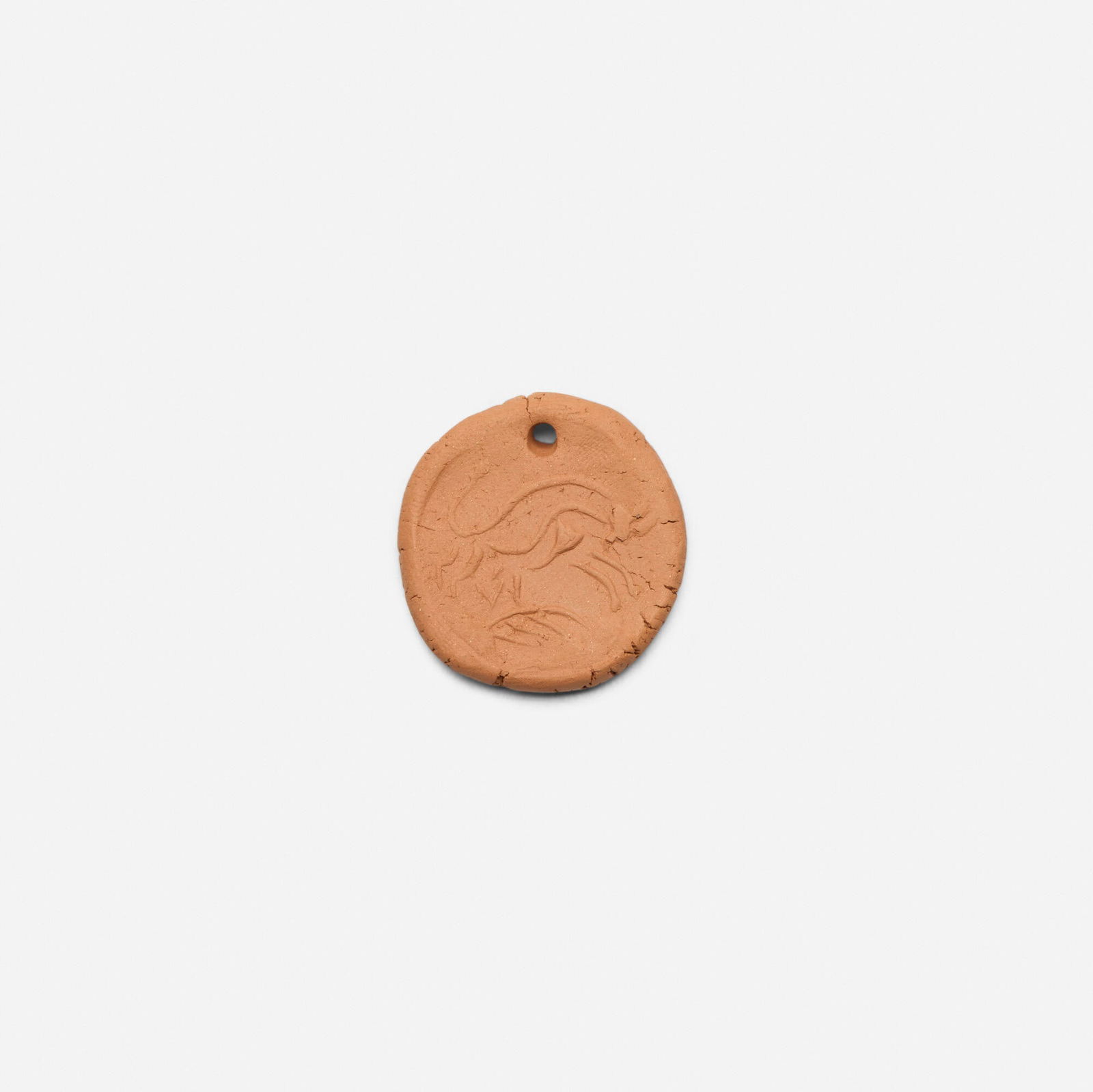 Pablo Picasso, Taureau attaquant: Pablo Picasso Taureau attaquant 1949red earthenware 0.25 h x 1.5 dia in (1 x 4 cm) Impressed studio marks to underside 'Madoura Empreinte Originale de Picasso'. This work is from the edition o
