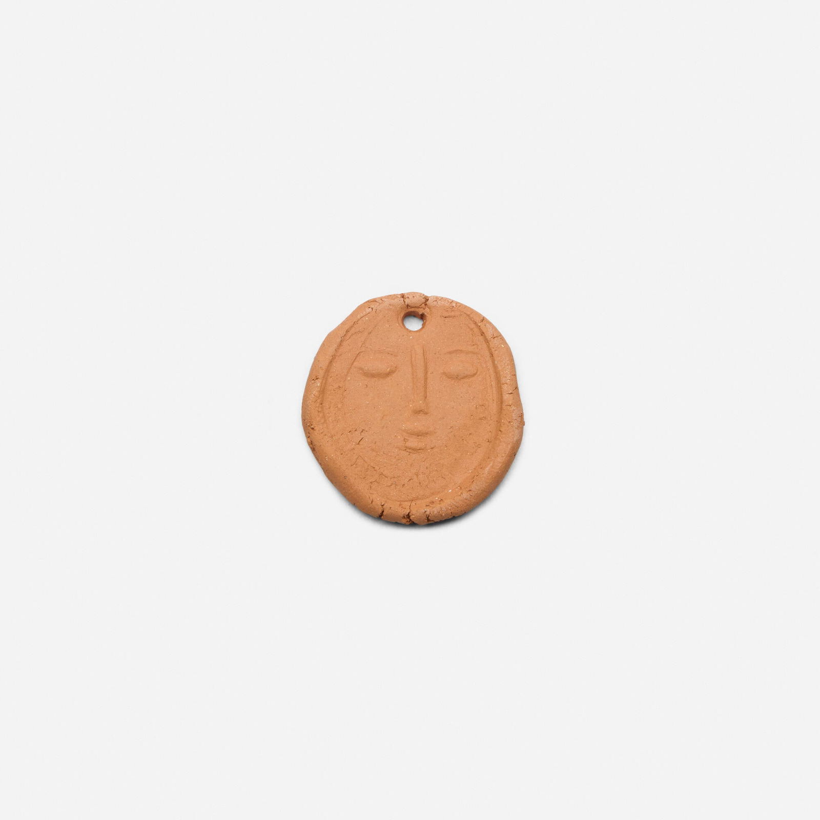 Pablo Picasso, Visage de femme: Pablo Picasso Visage de femme 1949red earthenware 0.25 h x 1.5 dia in (1 x 4 cm) Impressed studio marks to underside 'Madoura Empreinte Originale de Picasso'. This work is from the edition of