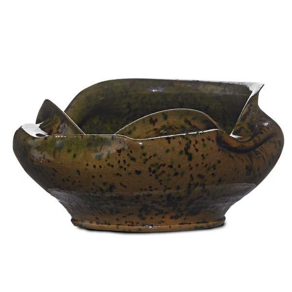 GEORGE OHR Squat vessel with folded rim: GEORGE OHR (1857 - 1918) Squat vessel with folded rim, green, yellow, and brown speckled glaze, Biloxi, MS, 1897-1900; Stamped G.E. OHR, Biloxi, Miss.; 2 1/2" x 5" Published: Ellison, George Ohr, Art