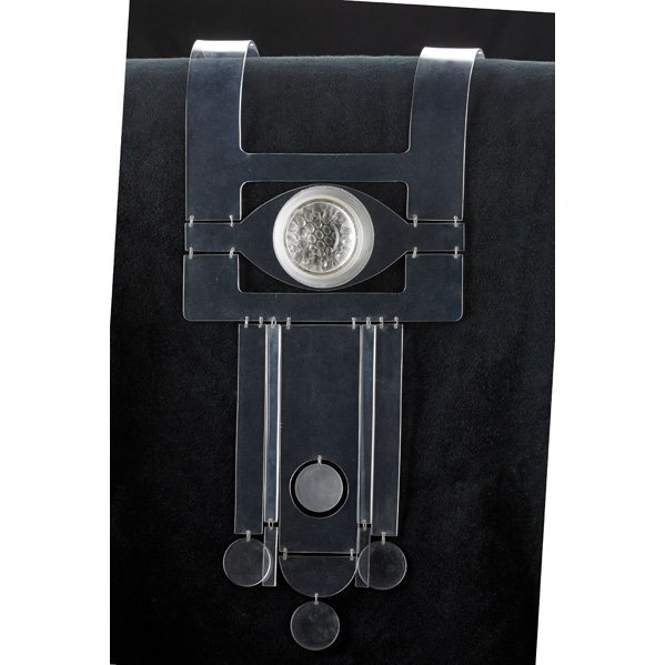 CAROLYN KRIEGMAN Plastic neckpiece: CAROLYN KRIEGMAN (1933 - 1999) Kinetic plastic neckpiece, USA, 1969; Plastic, plexiglass beads, metal rings; Signed and dated; 21" x 10" x 8" Note: There is a similar example in the Smithsonian Americ