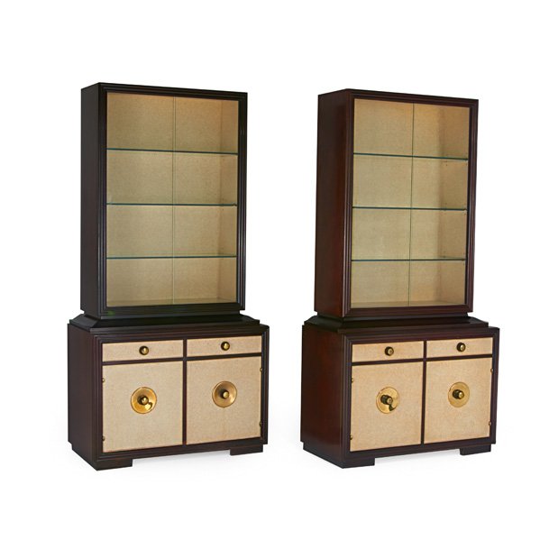 PAUL FRANKL; JOHNSON FURNITURE CO Pair of cabinets: PAUL FRANKL (1886 - 1958) JOHNSON FURNITURE CO Pair of cabinets, Grand Rapids, MI, 1940s; Stained and lacquered mahogany, lacquered cork, brass, glass; Stenciled numbers and branded; Each: 84" x 42" x
