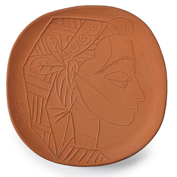 PABLO PICASSO; MADOURA Jacqueline charger: PABLO PICASSO (1881 - 1973) MADOURA Red earthenware charger, "Jacqueline's Profile (Profil de Jacqueline)," France, 1956; Stamped MADOURA PLEIN FEU EMPREINTE ORIGINALE DE PICASSO, numbered 3/100; 15 1