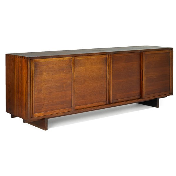 GEORGE NAKASHIMA Four-door cabinet: GEORGE NAKASHIMA (1905 - 1990) NAKASHIMA STUDIOS Four-door cabinet, New Hope, PA, 1952; American black walnut; Unmarked; 32" x 90 1/4" x 20" Provenance available: Original receipt
