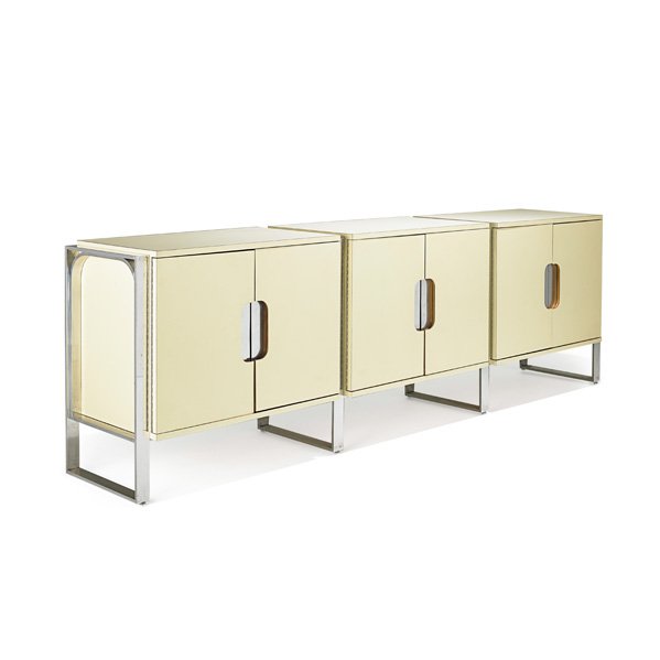 MILO BAUGHMAN; THAYER COGGIN Triple cabinet: MILO BAUGHMAN (1923 - 2003) THAYER COGGIN Triple cabinet, High Point, NC, 1970s; Polished aluminum, laminate, oak; Unmarked; 32 3/4" x 104 1/2" x 19"