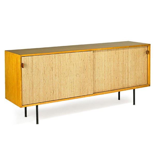 FLORENCE KNOLL; KNOLL ASSOCIATES Cabinet: FLORENCE KNOLL (b. 1917) KNOLL ASSOCIATES Sliding-door cabinet, New York, 1950s; Birch, grass cloth, leather, enameled metal; Unmarked; 31" x 71 1/2" x 18"