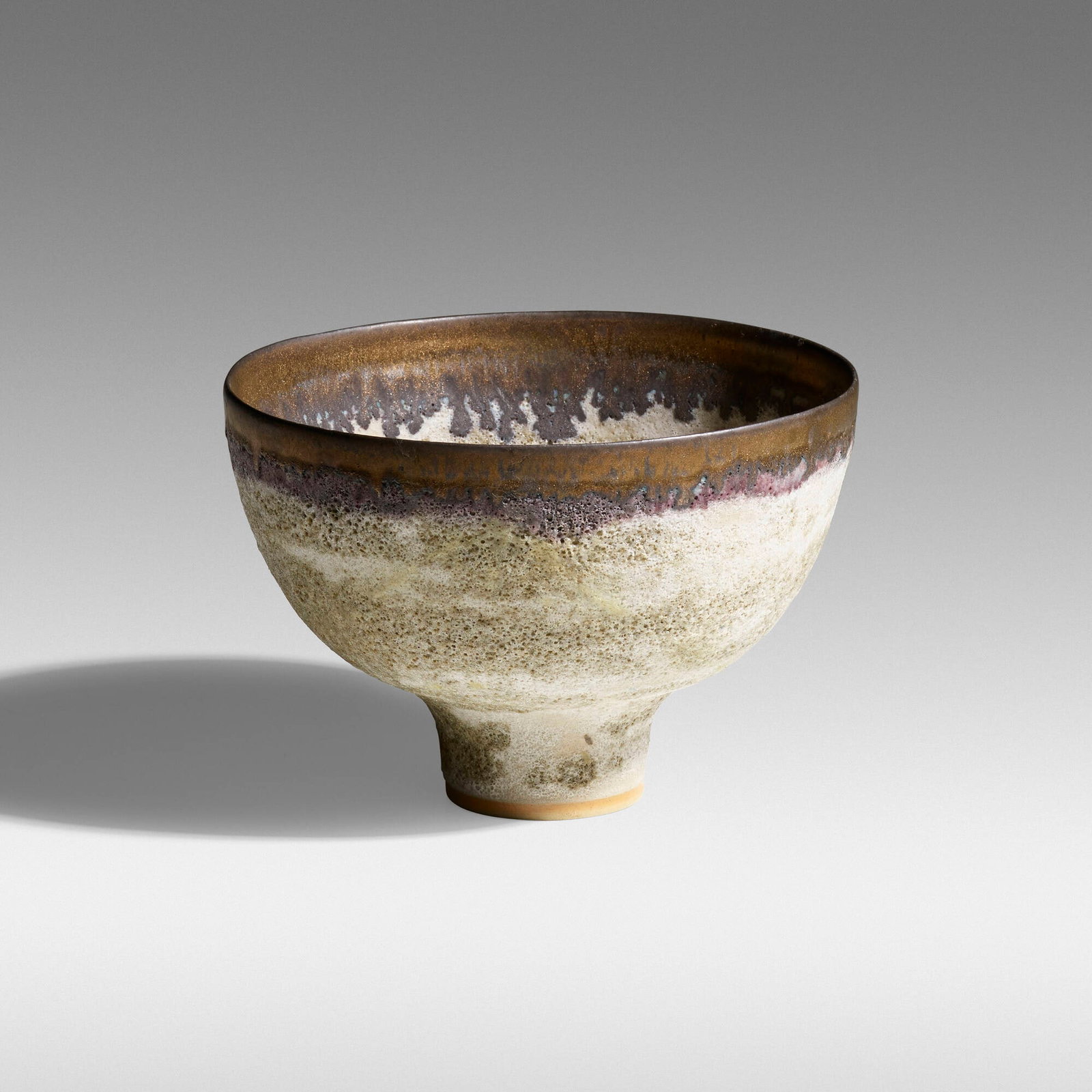 Lucie Rie, Bowl: Lucie Rie Bowl c. 1981volcanic-glazed stoneware, manganese lip 4.5 h x 6.5 dia in (11 x 17 cm) Glazed-over chop mark to underside. Sold with a digital copy of the original invoice. Professiona