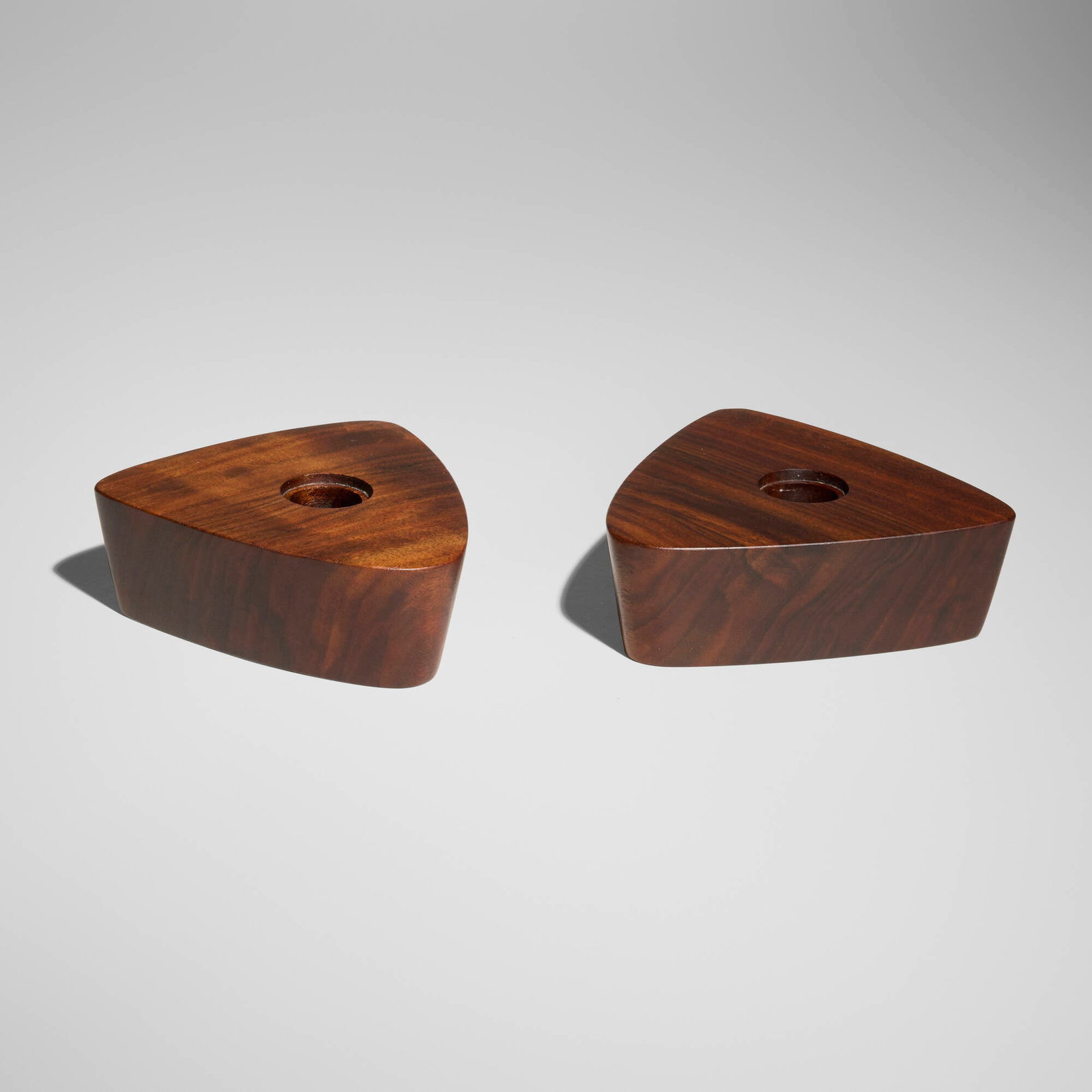 Mira Nakashima, Candle holders, pair: Mira Nakashima Candle holders, pair Nakashima Studio USA, 2010 claro walnut 1.625 h x 4.5 w x 4.875 d in (4 x 11 x 12 cm) 1.625 h x 4.875 w x 4.75 d in (4 x 12 x 12 cm) Signed and dated with wood