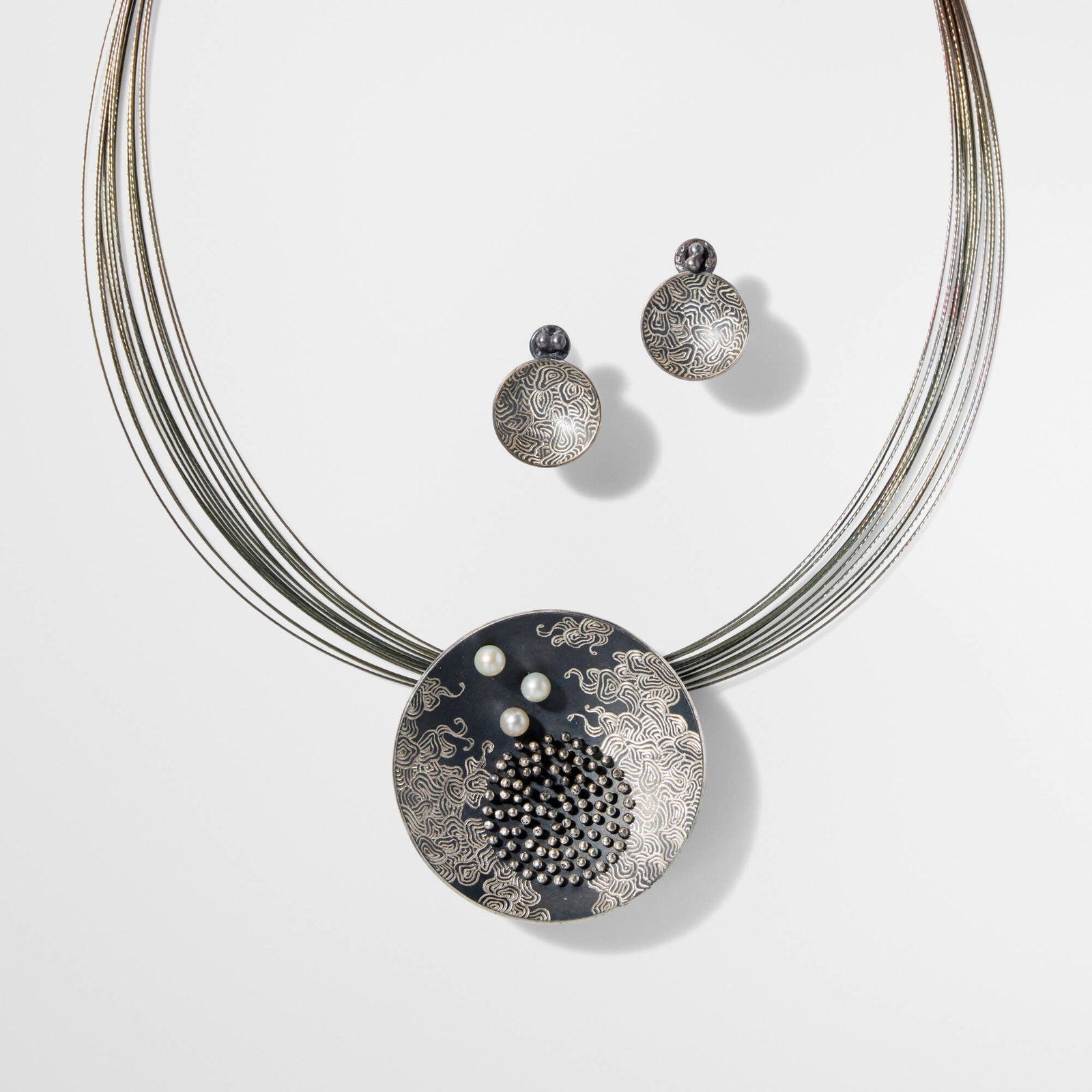 So Young Park, Splashing Water pendant necklace and earrings: So Young Park Splashing Water pendant necklace and earrings c. 2015oxidized silver, freshwater pearl chain: 17.75 l in (45 cm) pendant: 0.5 d x 1.875 dia in (1 x 5 cm) earrings: 0.875 h x 0.75