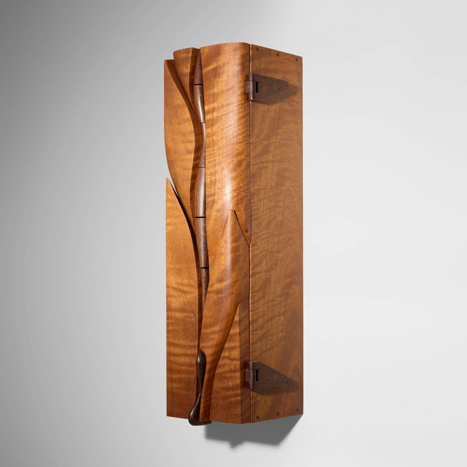 Charles B. Cobb, Wall-mounting jewelry box: Charles B. Cobb Wall-mounting jewelry box 1985 shedua, wenge 24.75 h x 7.25 w x 7.5 d in (63 x 18 x 19 cm) Incised signature, date, wood type, and number to lower corner '1985 Charles B. Cobb