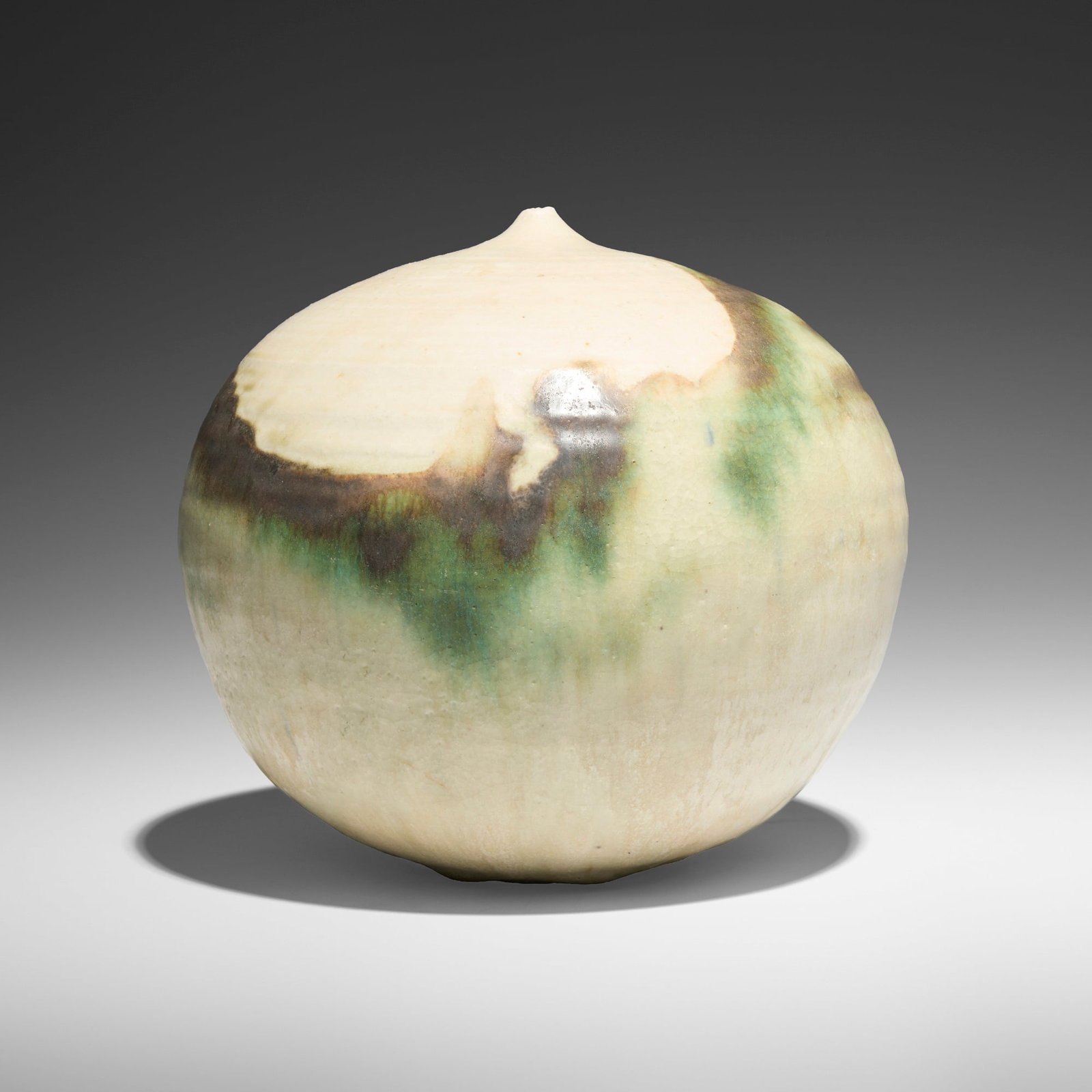 Toshiko Takaezu, Closed Form (with rattle): Toshiko Takaezu Closed Form (with rattle) c. 1975 glazed porcelain 6.125 h x 7 dia in (16 x 18 cm) Provenance: Private Collection This work will ship from Lambertville, New Jersey.
