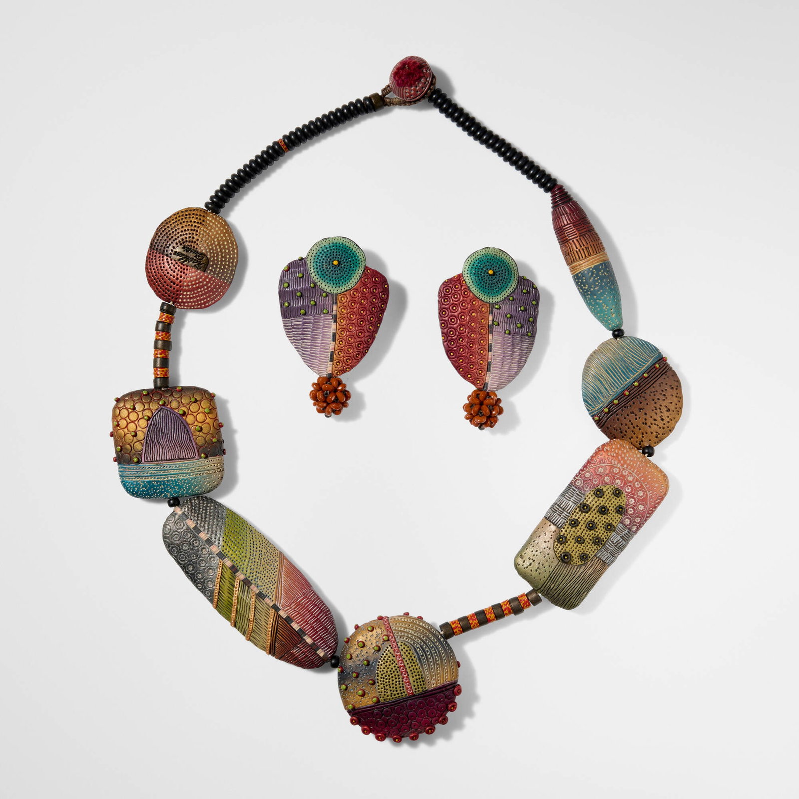 Kathleen Dustin, Silk Road necklace and earrings: Kathleen Dustin Silk Road necklace and earrings c. 2015 polymer clay, glass beads, silicone beads necklace: 1.875 h x 0.5 d x 23 l in (5 x 1 x 58 cm) earrings: 2.5 h x 1.5 w x 0.5 d in (6 x 4 x 1
