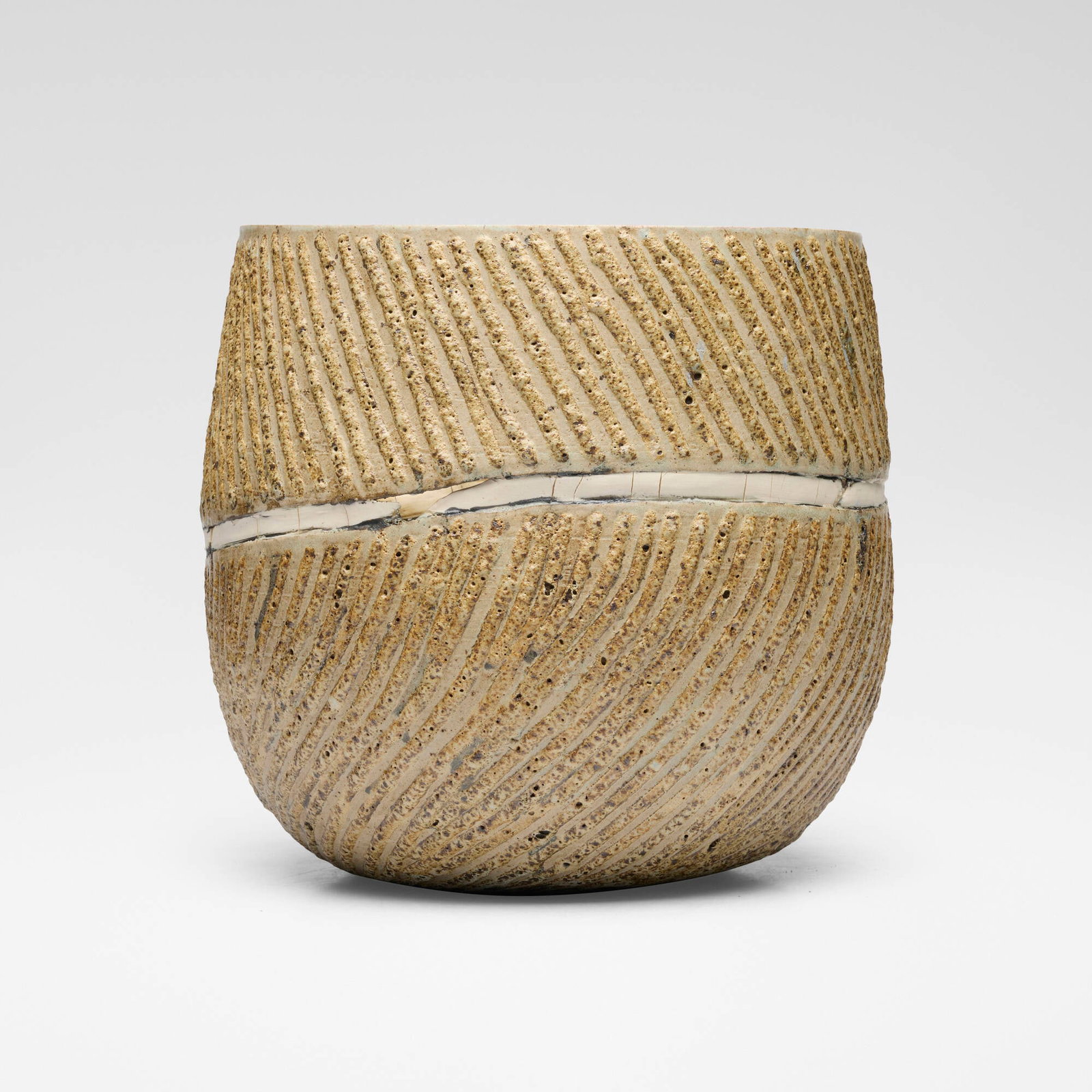 Ani Kasten, Striated Vessel with Porcelain Band: Ani Kasten Striated Vessel with Porcelain Band c. 2010glazed stoneware and porcelain 13 h x 13.75 dia in (33 x 35 cm) Raised artist's cipher to underside 'A'. Provenance: