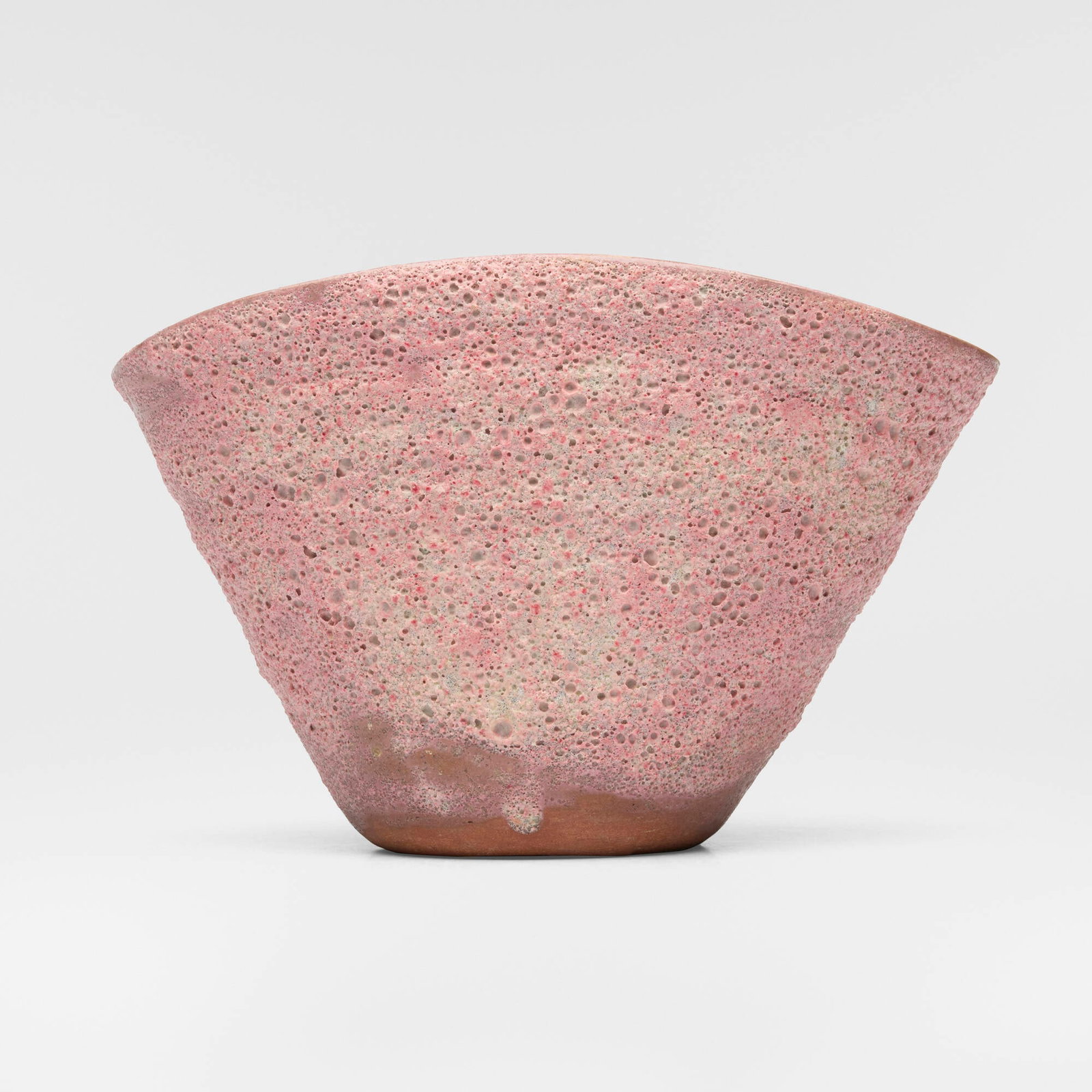 Beatrice Wood, Folded vase: Beatrice Wood Folded vase c. 1980volcanic-glazed earthenware 6.5 h x 9.625 w x 5 d in (17 x 24 x 13 cm) Slip signature to underside 'Beato'. Provenance: Collection of D