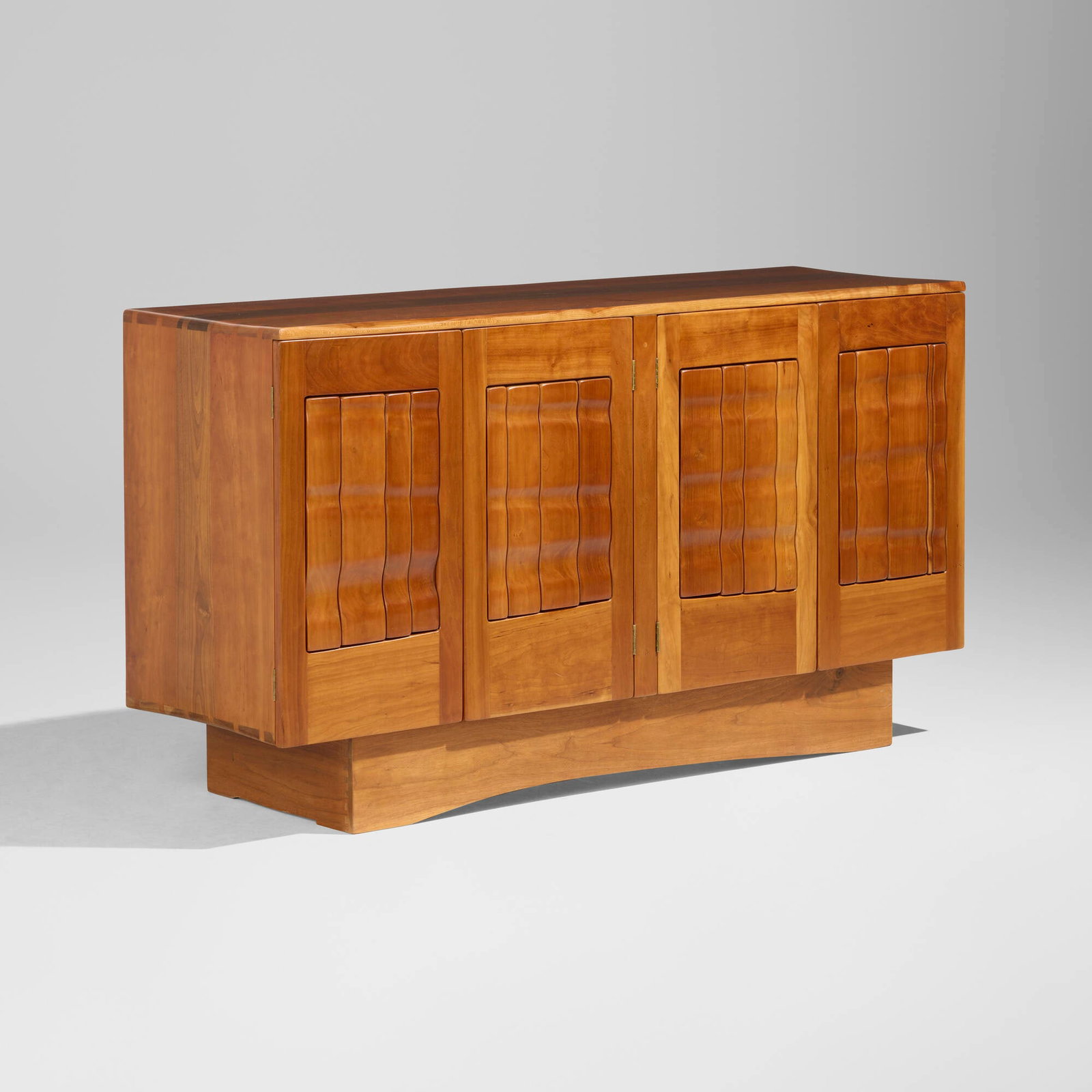Lawrence Ross, Cabinet: Lawrence Ross Cabinet USA, 1978cherry, walnut 33.25 h x 59.75 w x 19 d in (84 x 152 x 48 cm) Cabinet features four doors concealing three adjustable shelves and three drawers. Carved signature