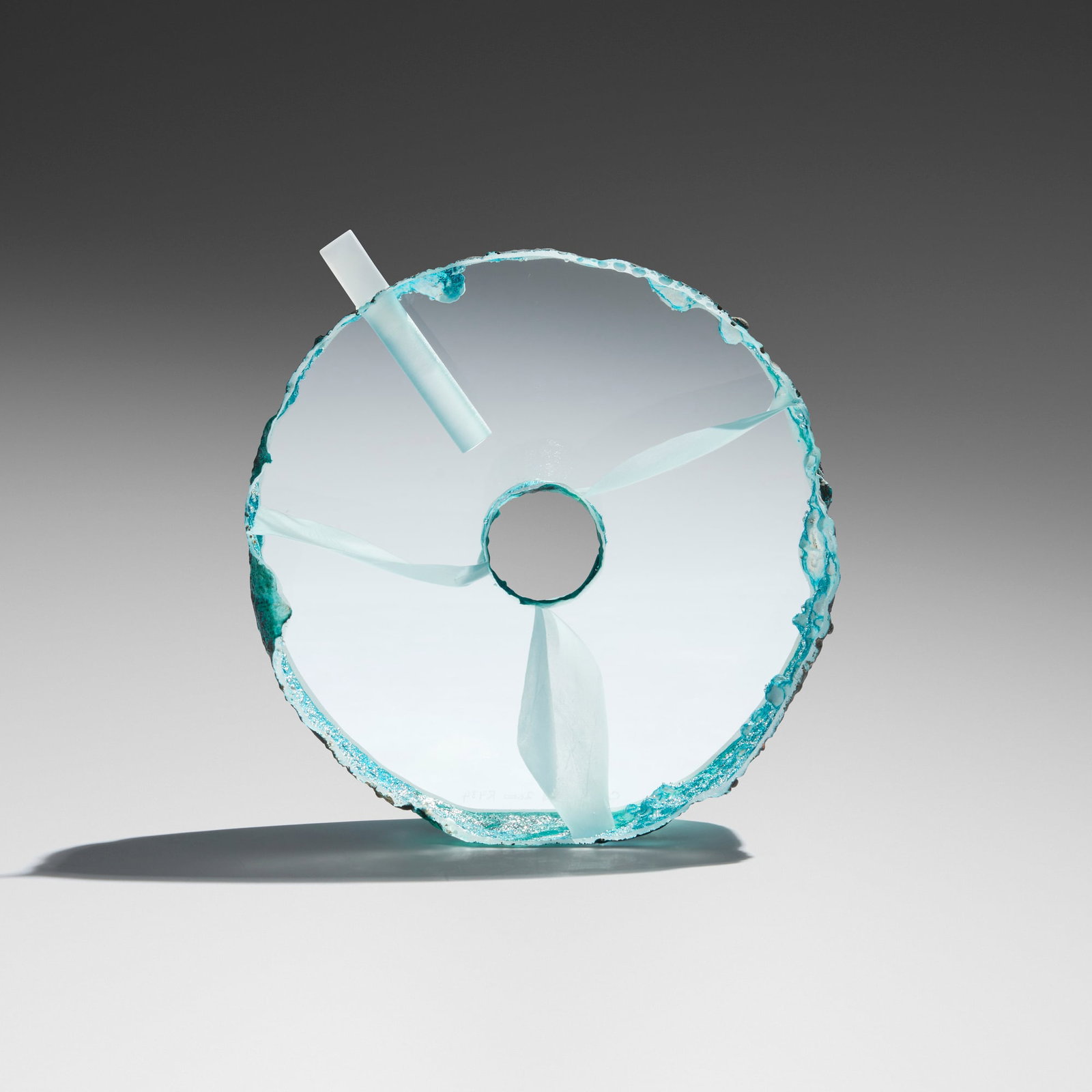 Colin Reid, R943 (Disc): Colin Reid R943 (Disc) 2000cast and polished optical glass 6.75 h x 6.5 dia in (17 x 17 cm) Etched signature, date, and title to lower edge 'Colin Reid 2000 R943'. Provenance:</