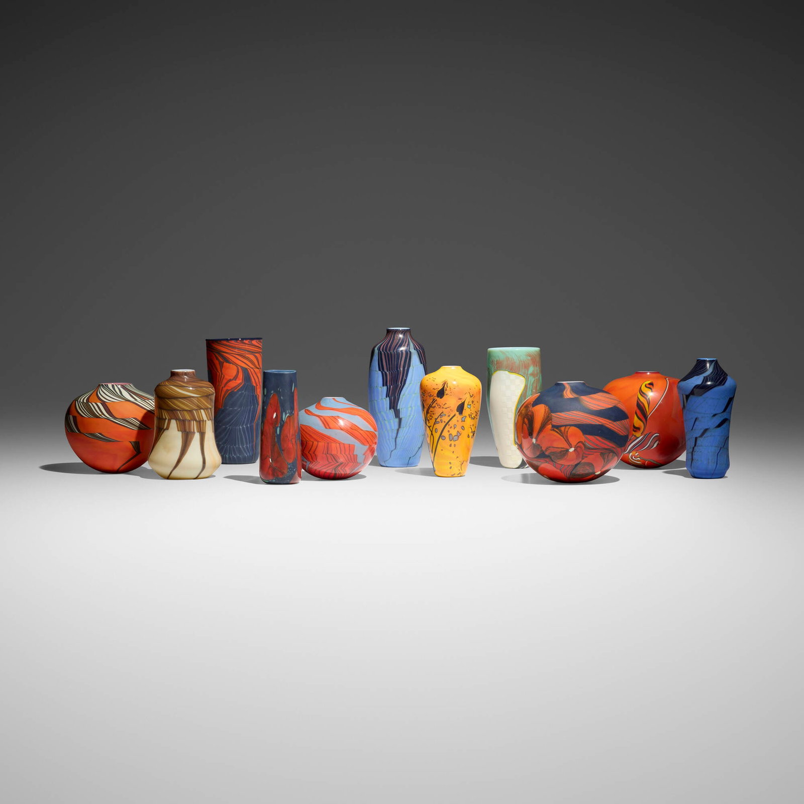 George Thiewes, Collection of eleven works: George Thiewes Collection of eleven works c. 1980-1984hand-blown glass tallest: 8 h x 3.5 dia in (20 x 9 cm) shortest: 4.5 h x 4.75 dia in (11 x 12 cm) Etched signature to nine examples 'Th